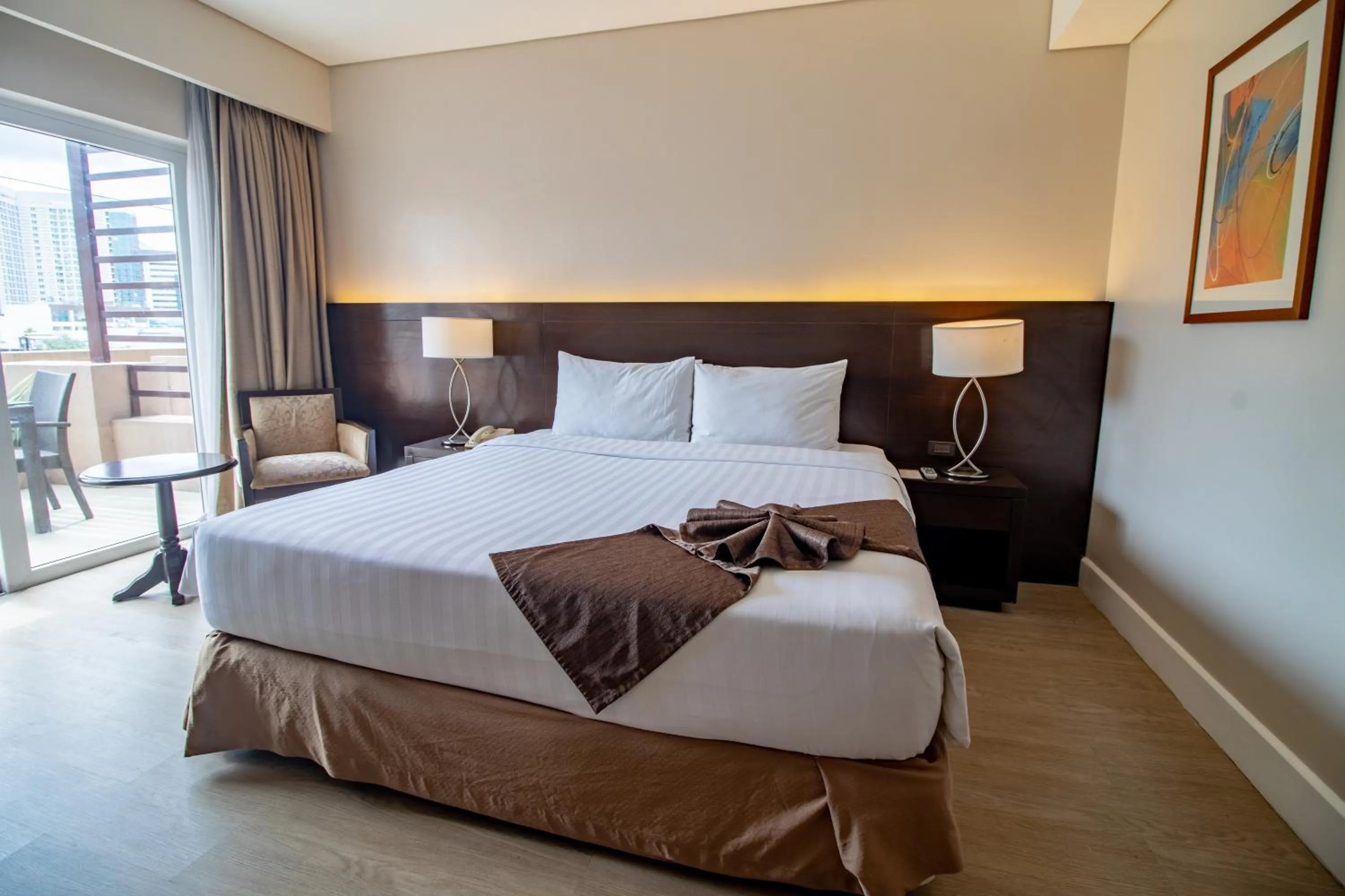 Bed in Harolds Hotel Cebu