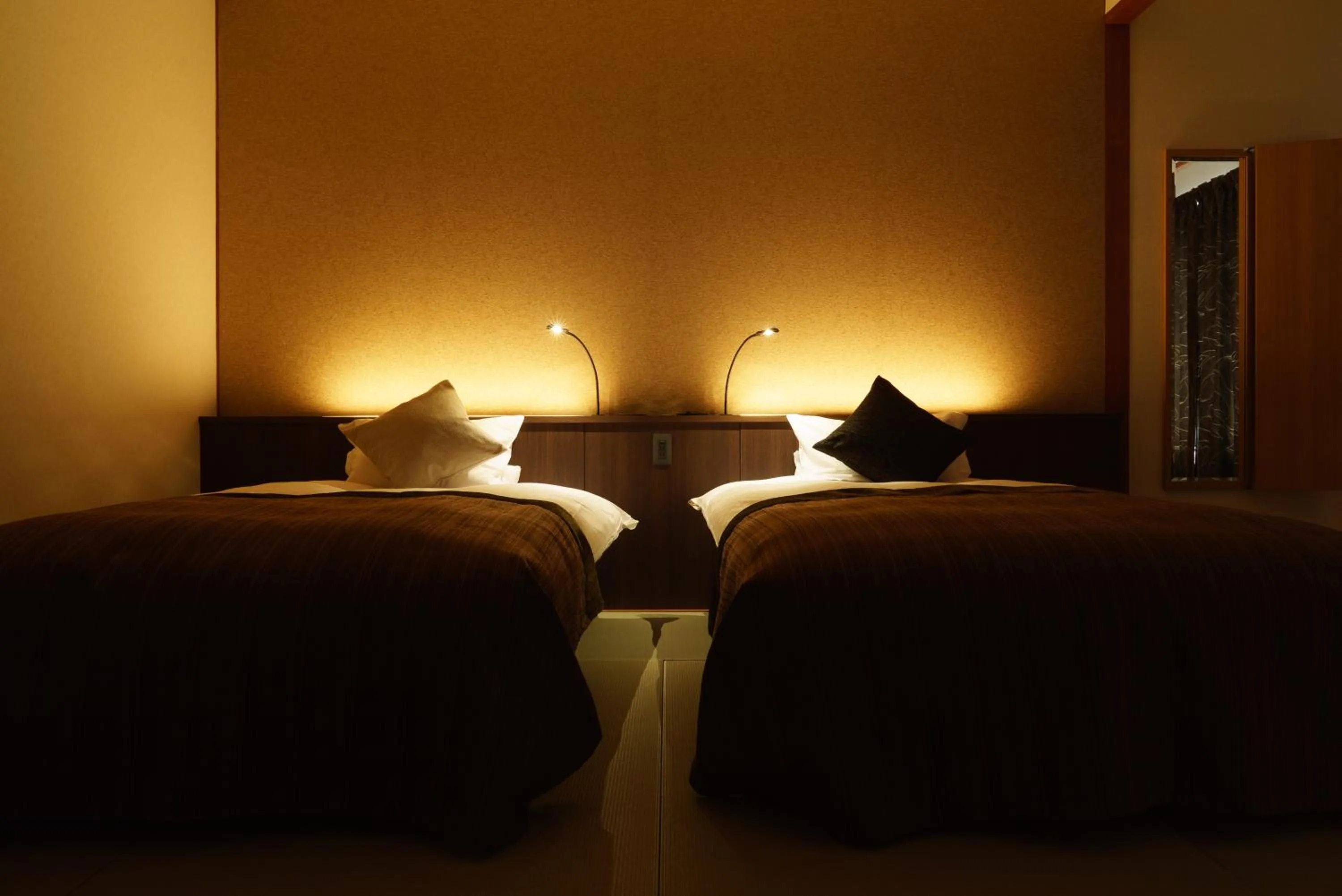 Bed in Kintarou Onsen Hotel