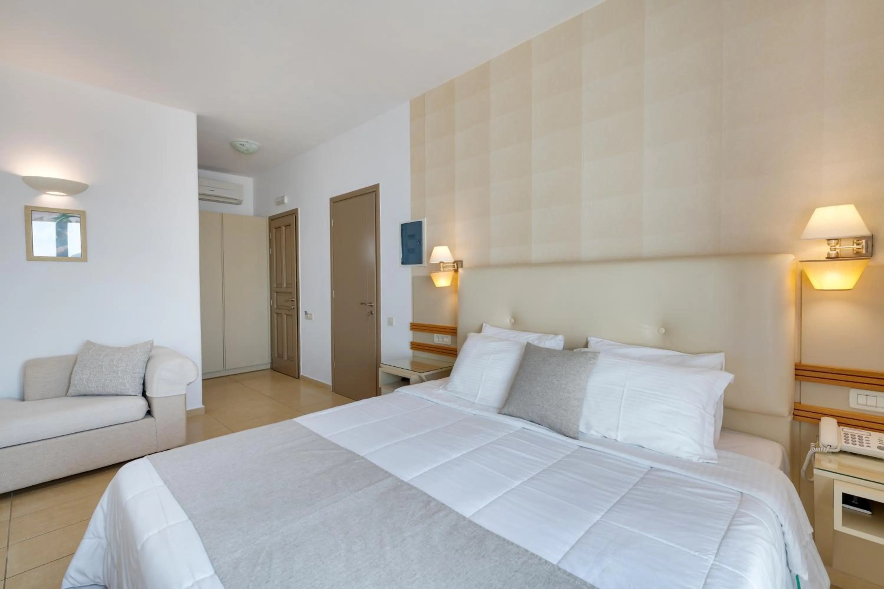 Photo of the whole room, Bed in Lithos by Spyros & Flora