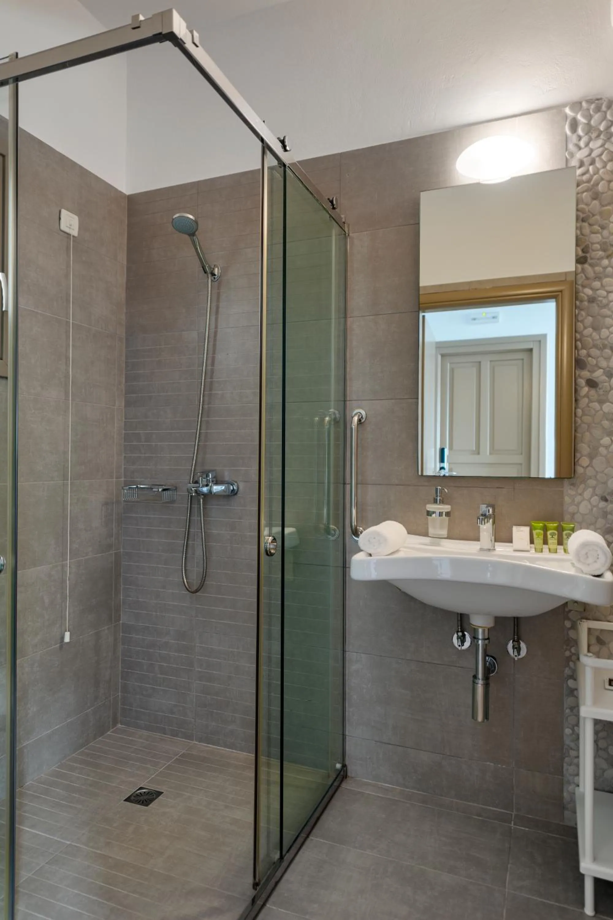 Shower in Lithos by Spyros & Flora