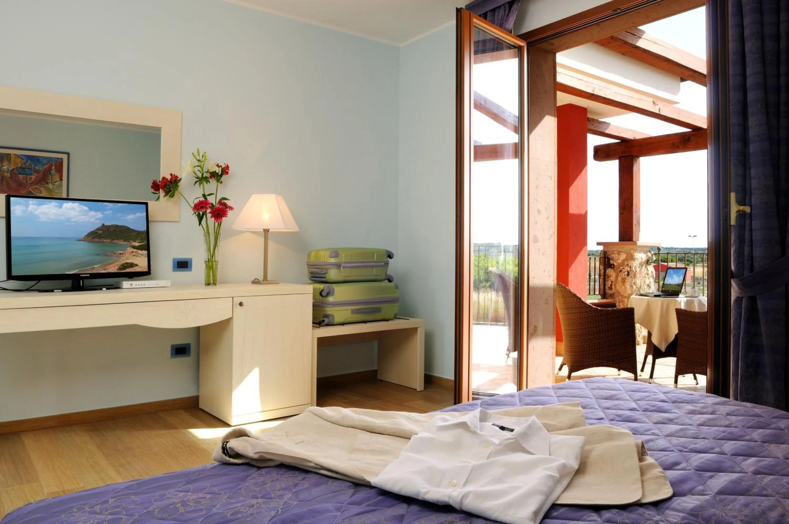 Bed in Hotel Sa Cheya Relais & Spa