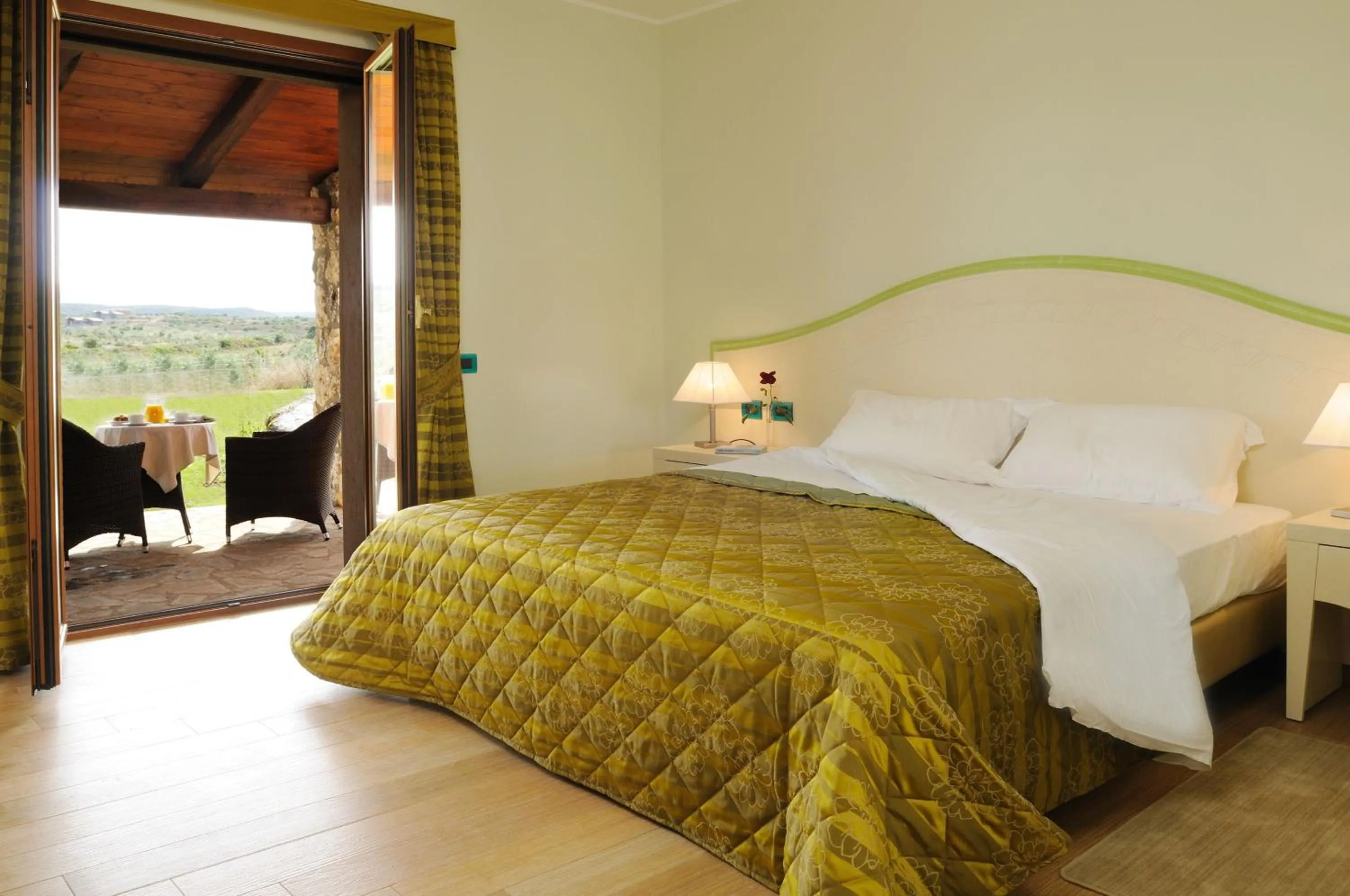 Bed in Hotel Sa Cheya Relais & Spa