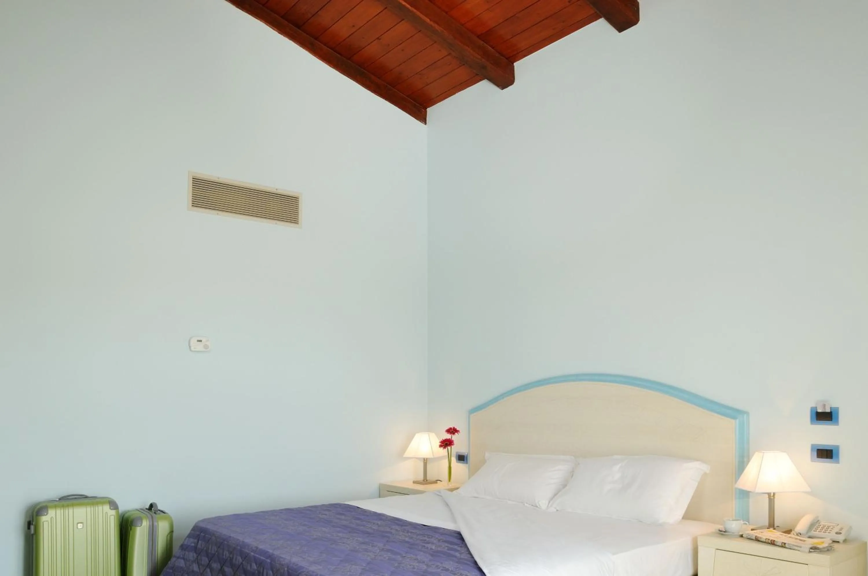 Bed in Hotel Sa Cheya Relais & Spa