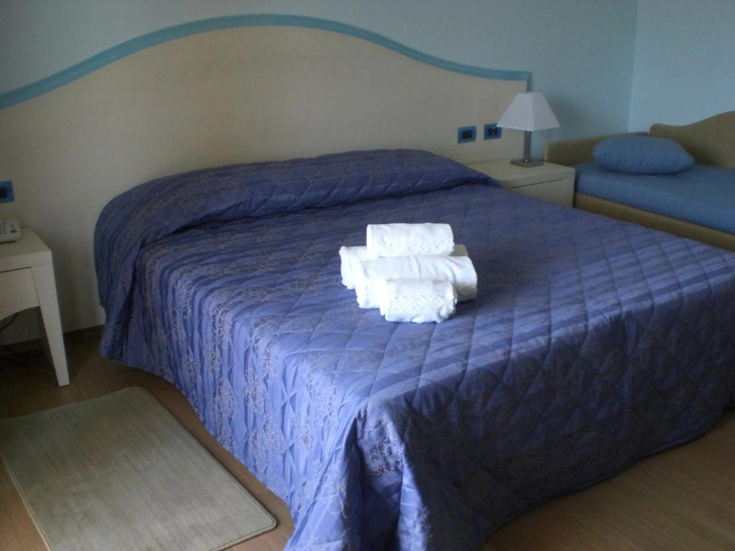 Bed in Hotel Sa Cheya Relais & Spa