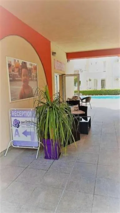 Rose Garden Omax Apartments