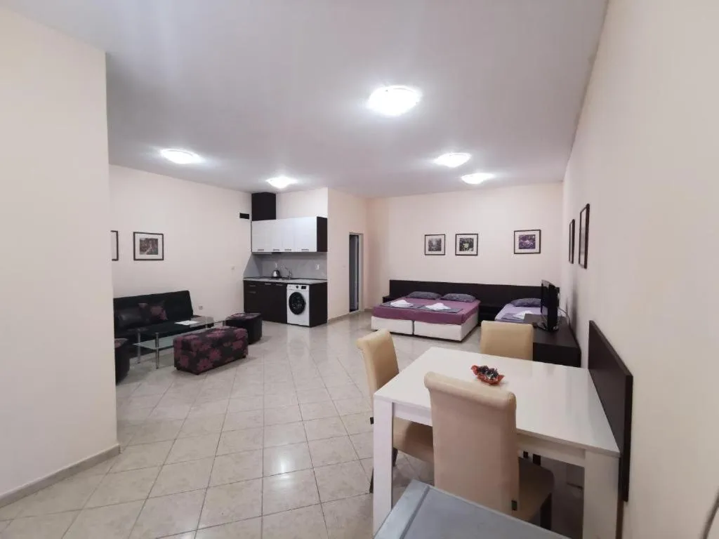 Bed in Rose Garden Omax Apartments