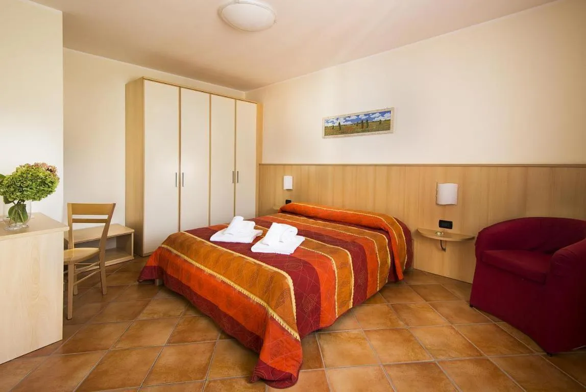 Photo of the whole room, Bed in Residence Corte Camaldoli