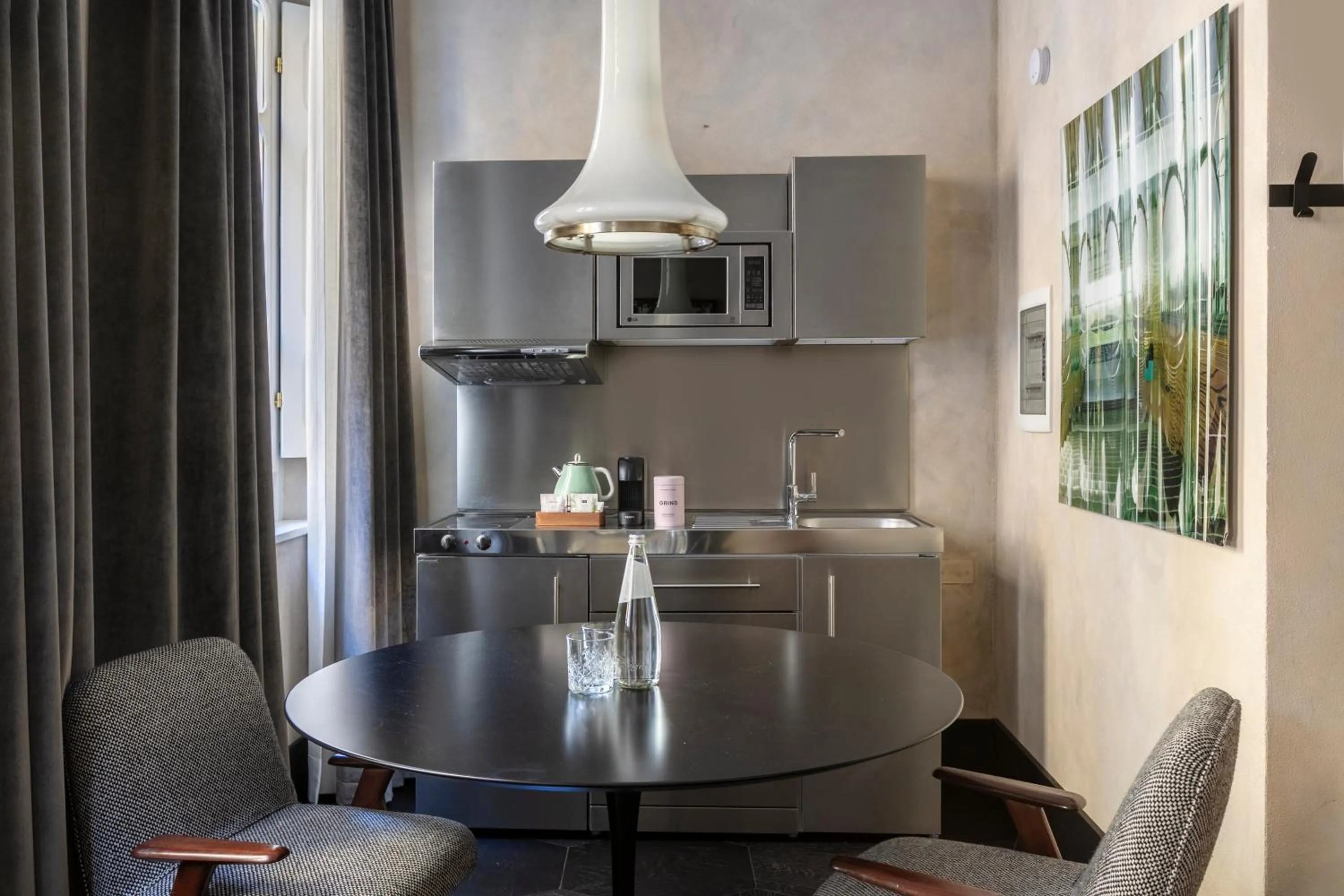 Kitchen or kitchenette in Numa Florence Palazzo Moro
