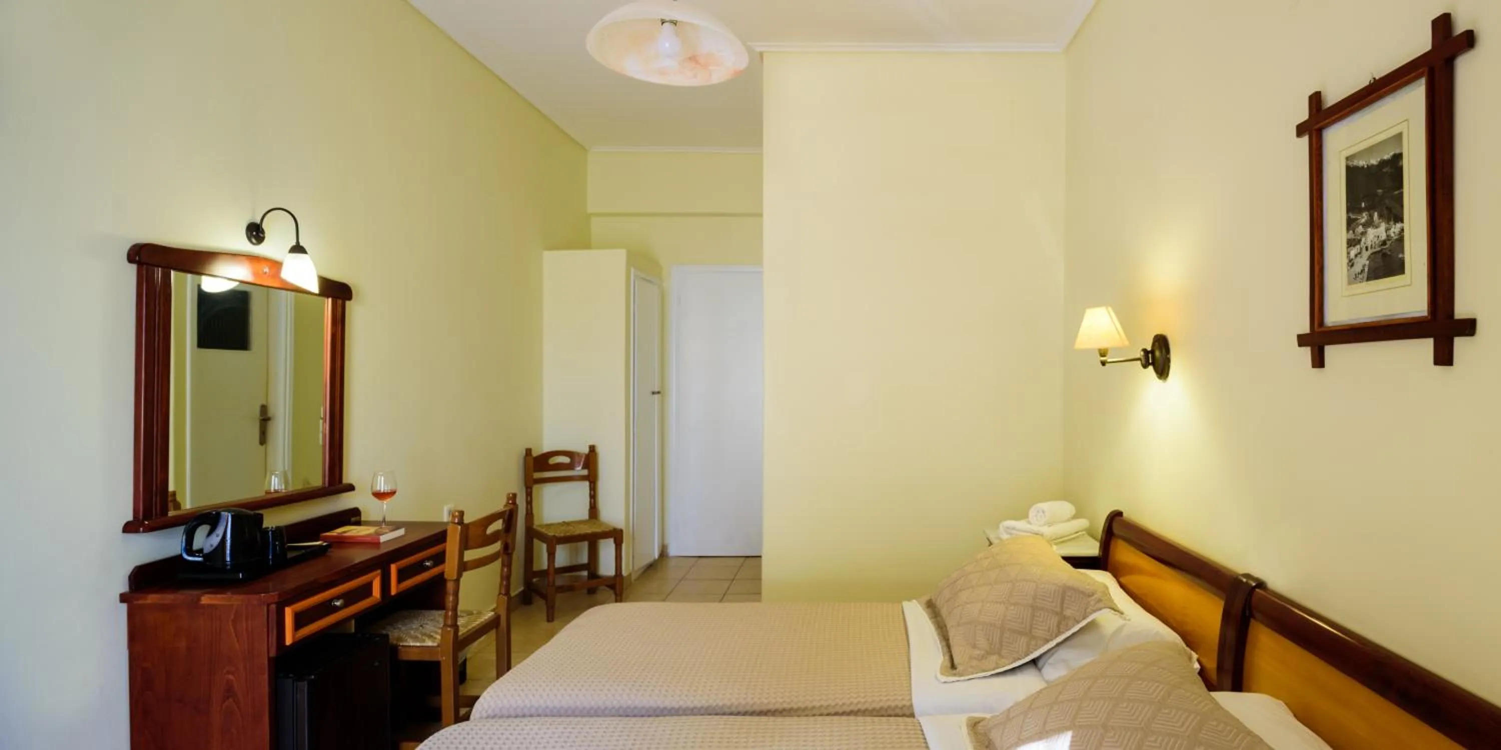 Bed in Karidis Hotel