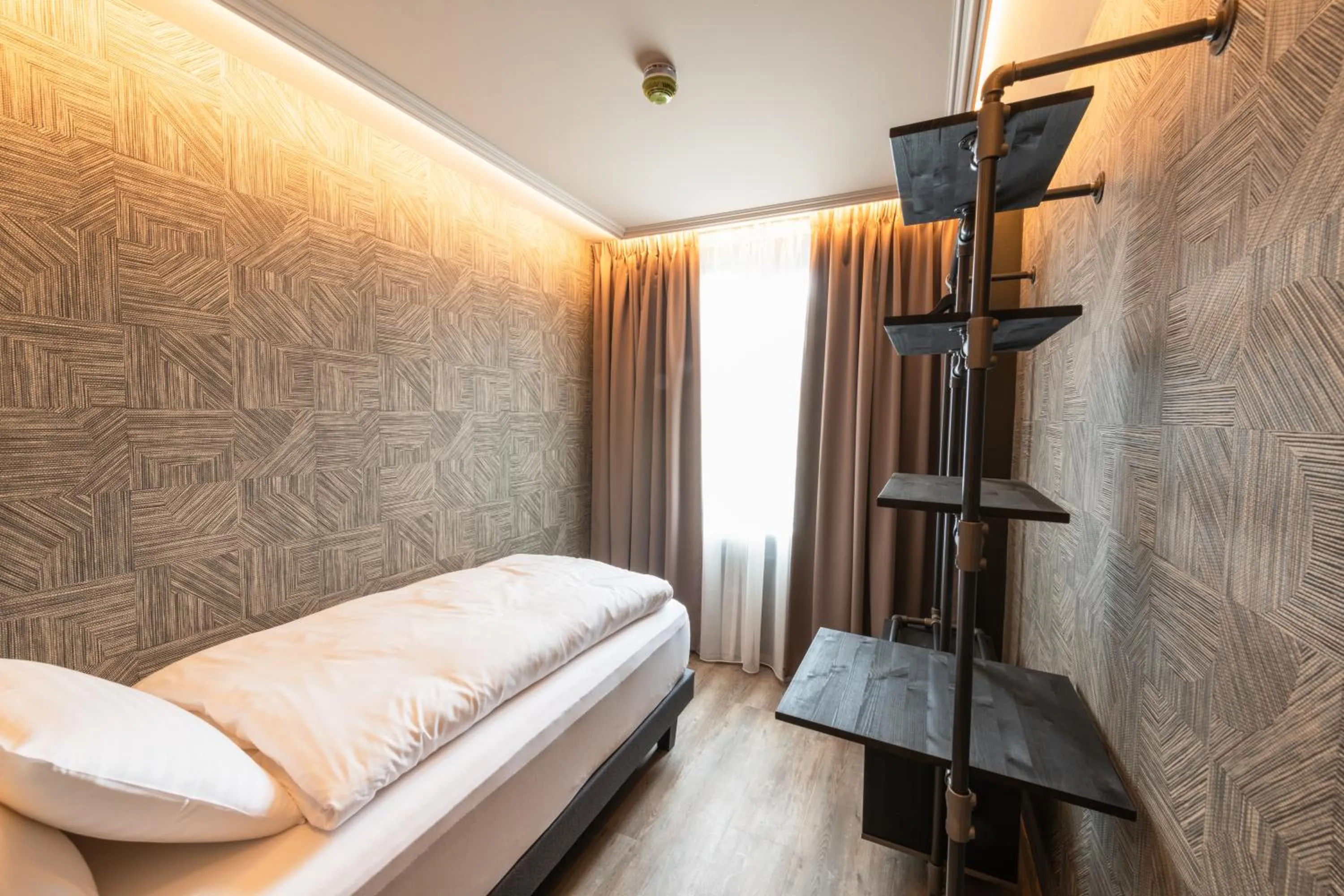 Bedroom in Centrum Hotel