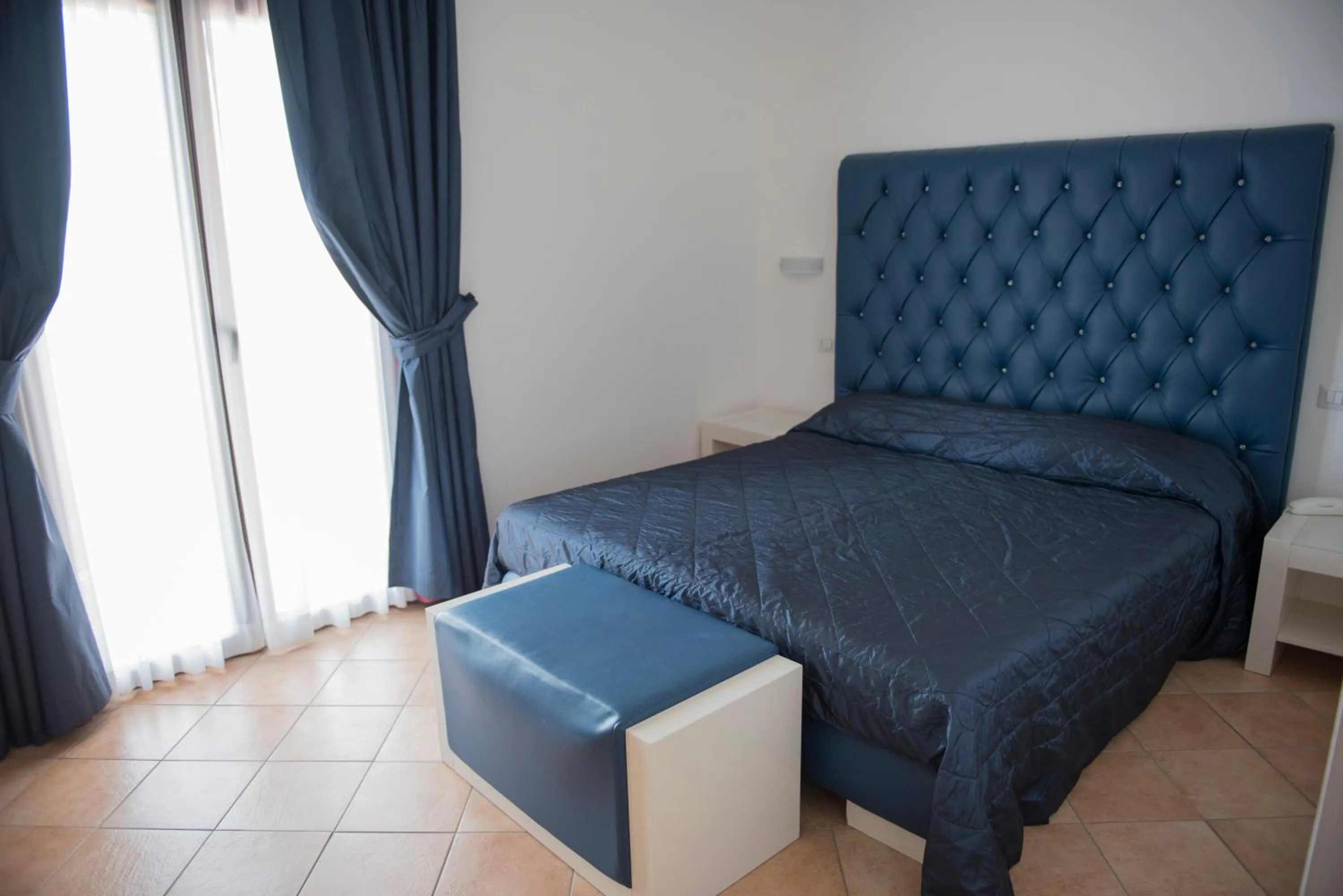 Bed in Hotel Caluna Charme