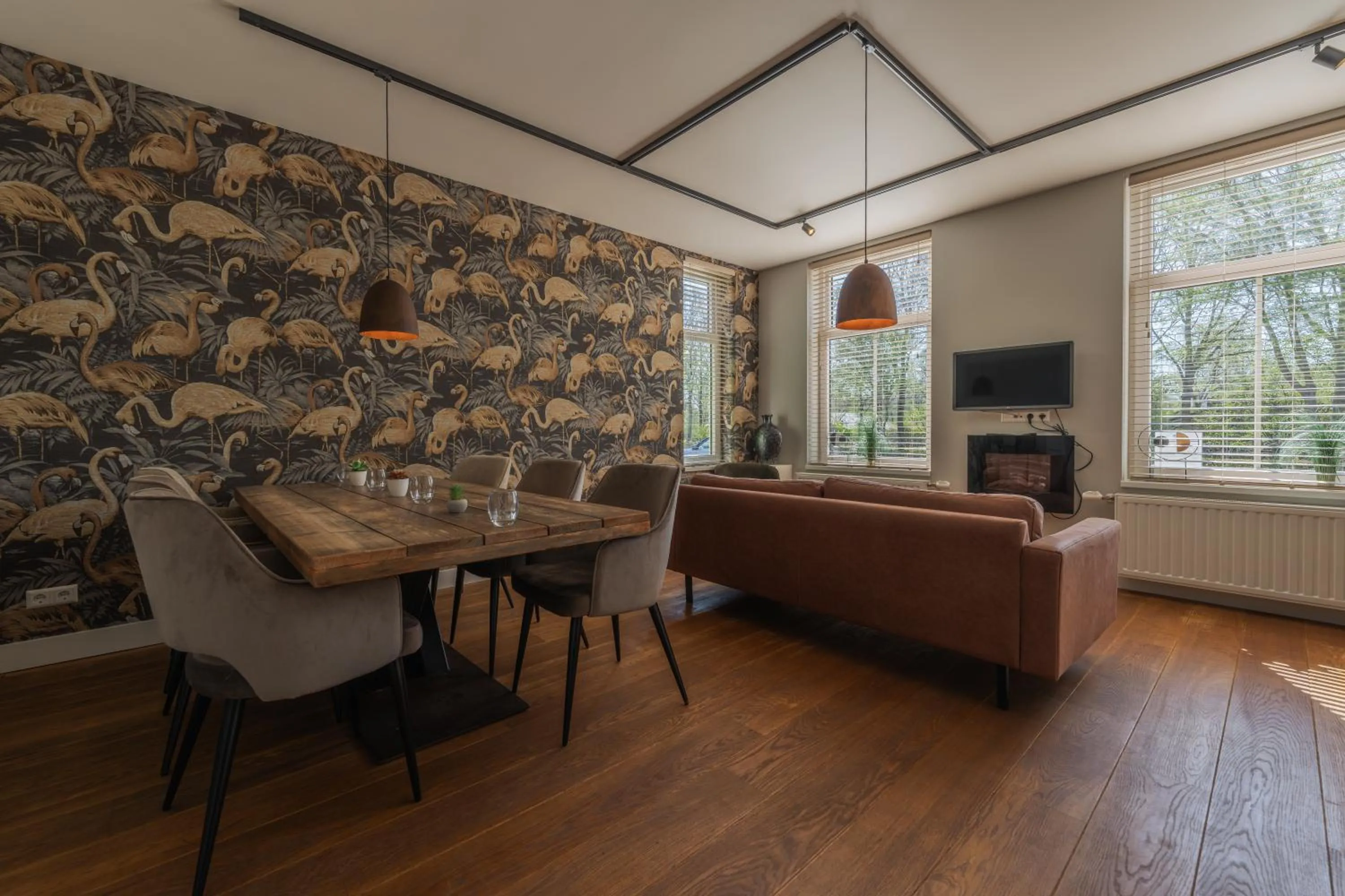 Communal lounge/ TV room in B&B Dennenbos