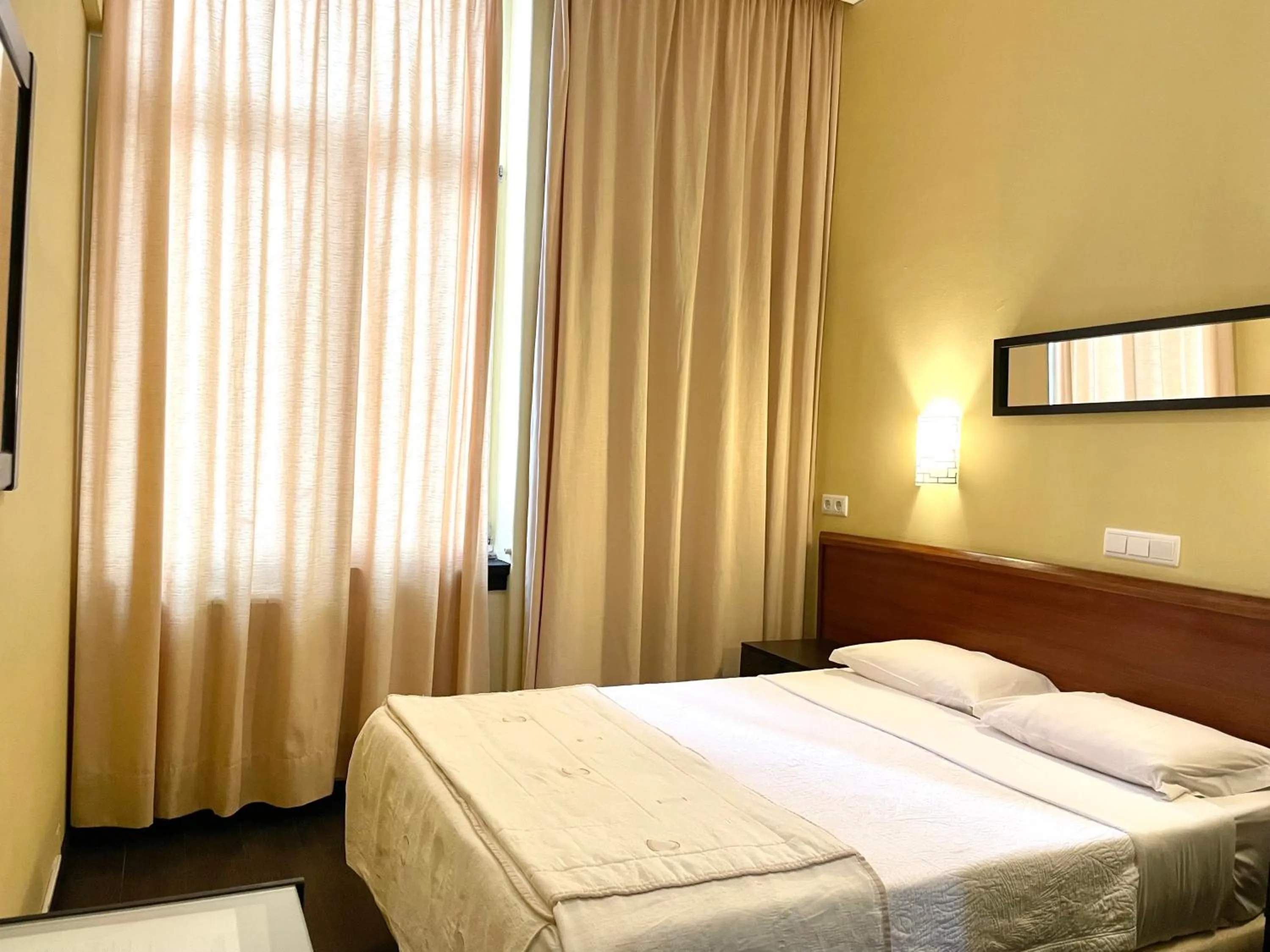 Bed in Hotel Universal