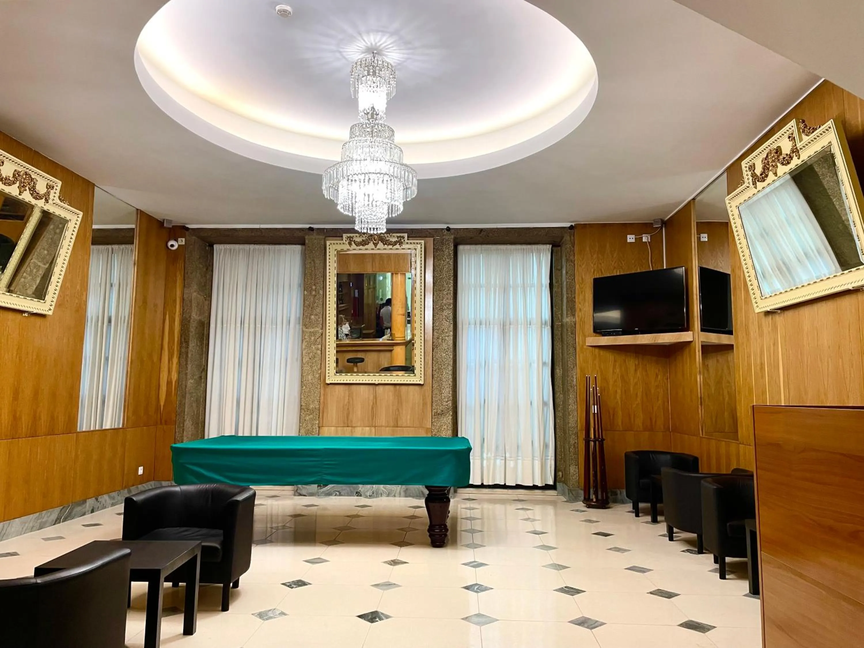 Communal lounge/ TV room in Hotel Universal