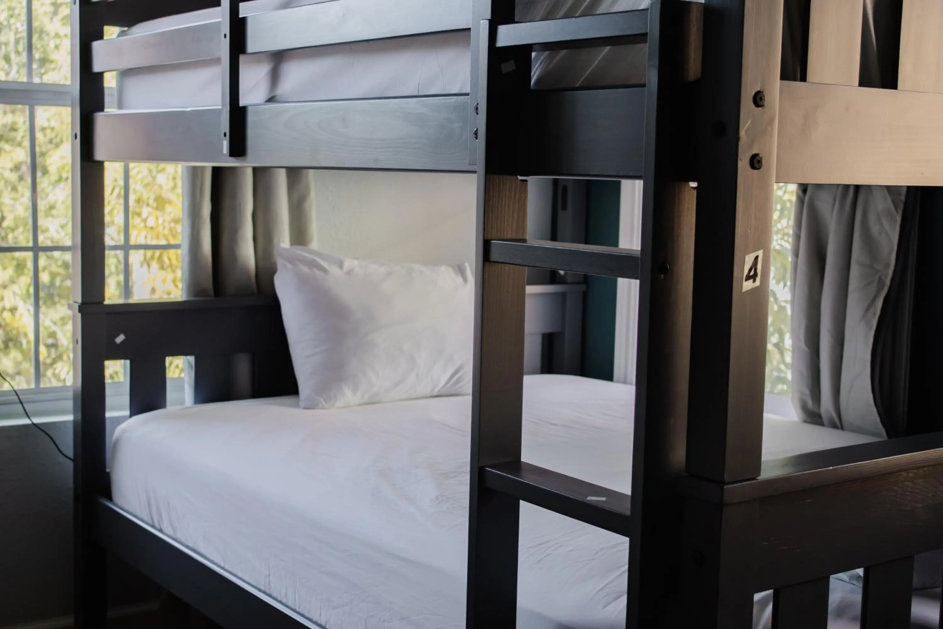 Bedroom, Bed in Wanderstay Houston Hostel