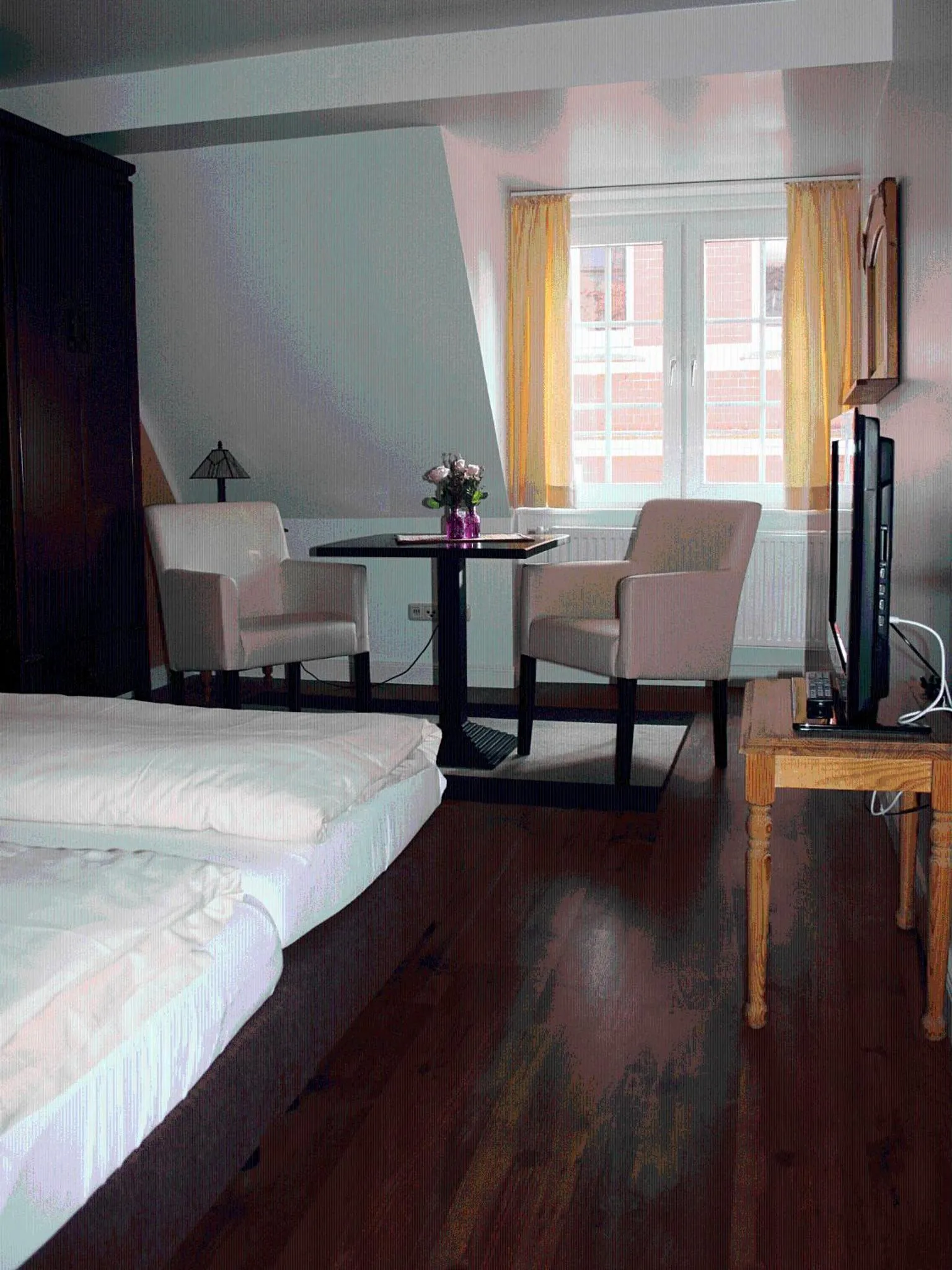 Photo of the whole room, Bed in Apartments im Kaffeehaus Heldt
