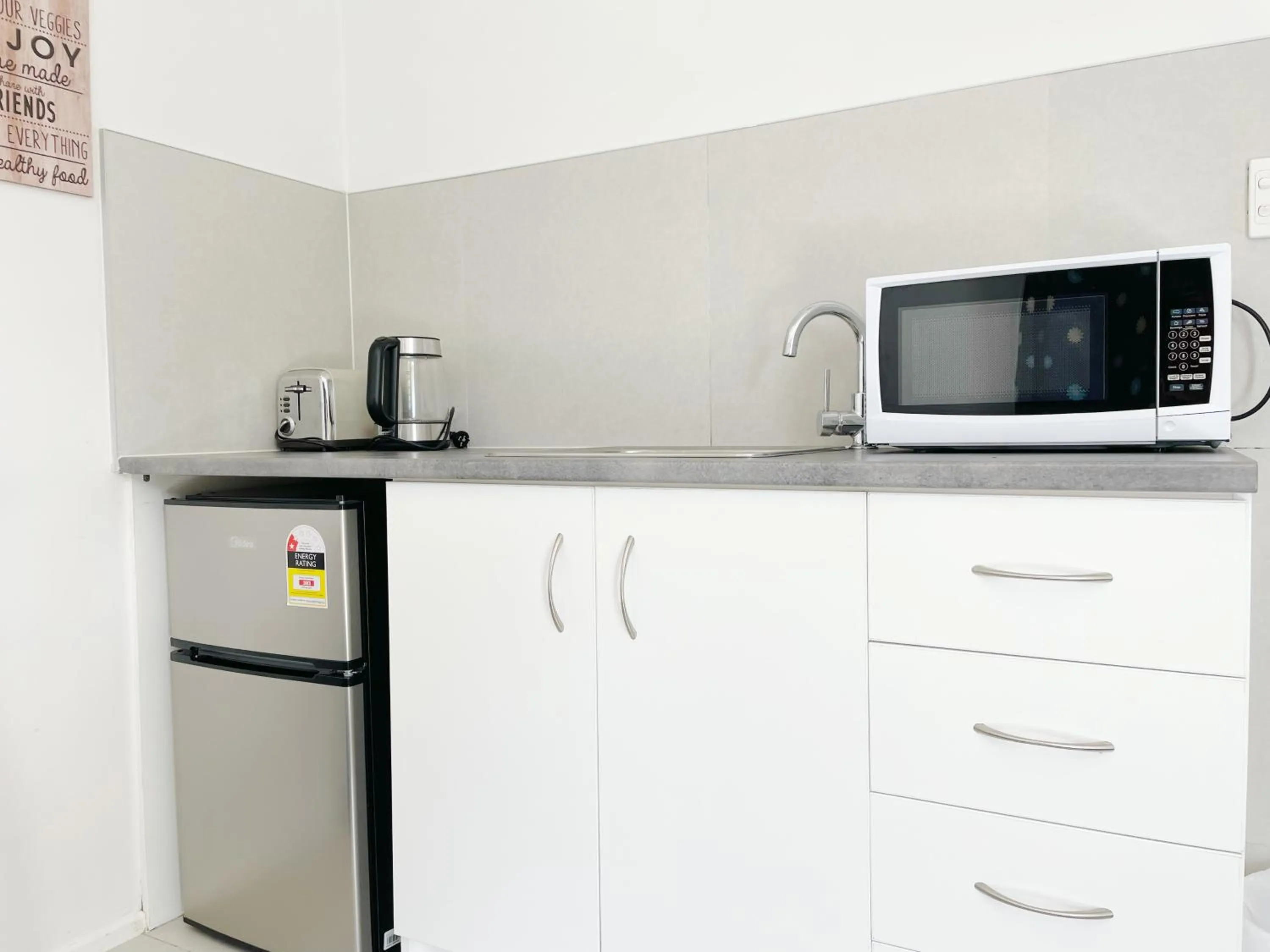 kitchen in Pupuke Manor Motel