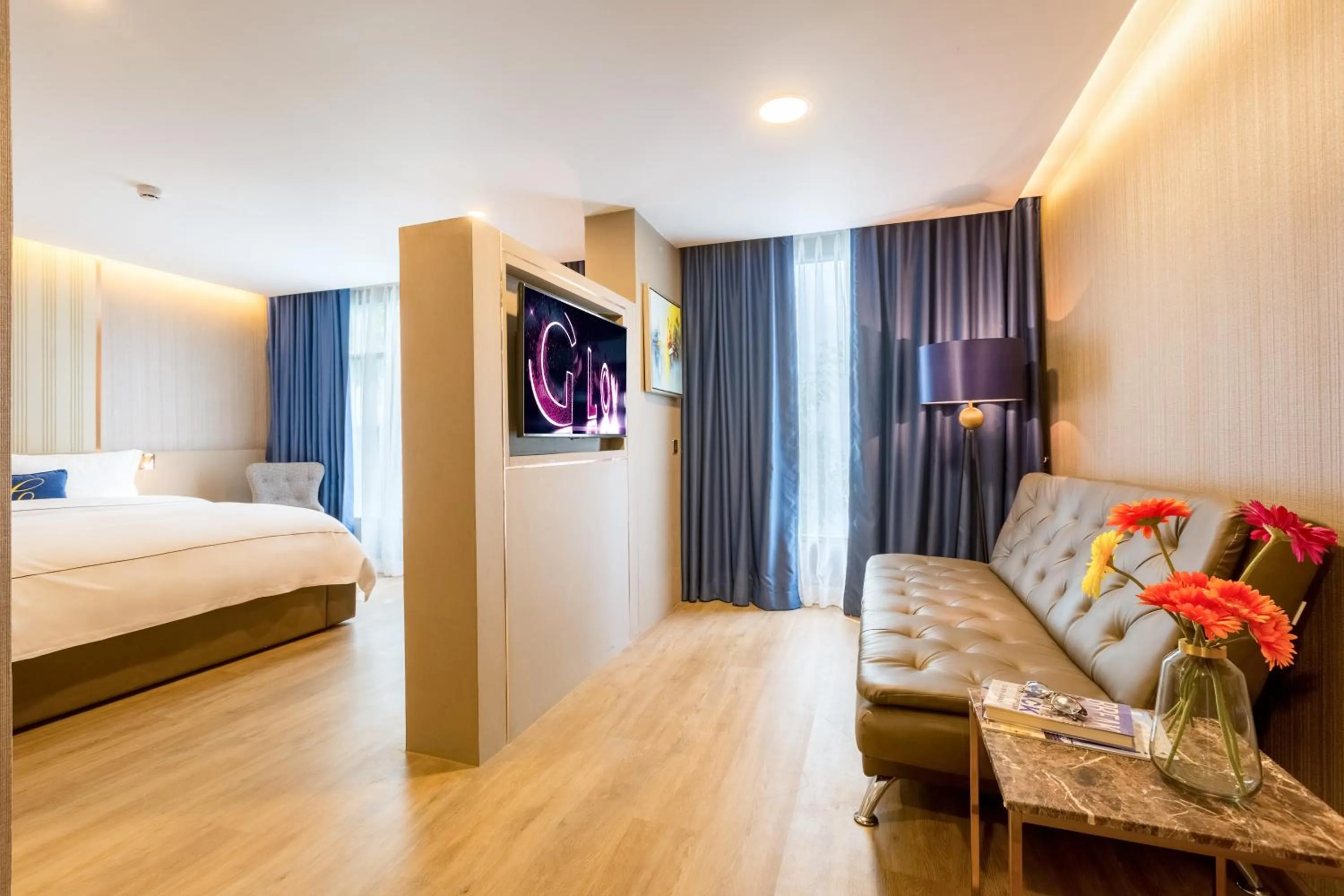 Communal lounge/ TV room, Bed in GLOW Sukhumvit 5