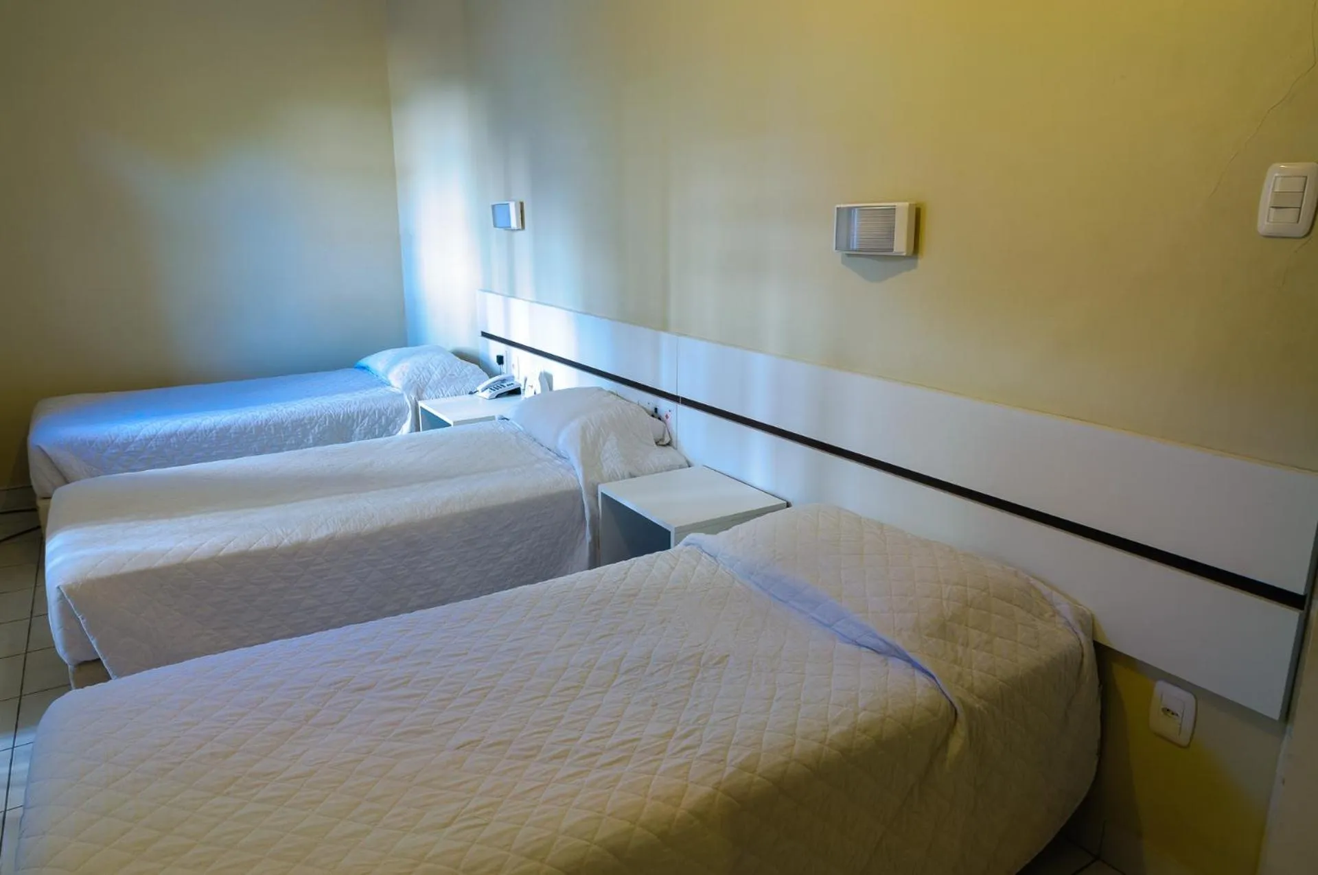 Bed in Hotel Elevado