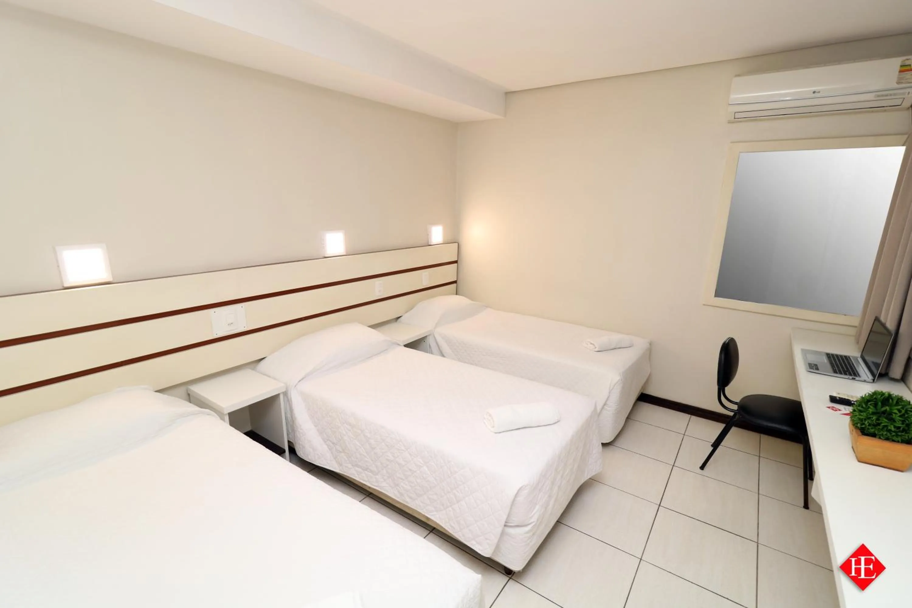 Bed in Hotel Elevado