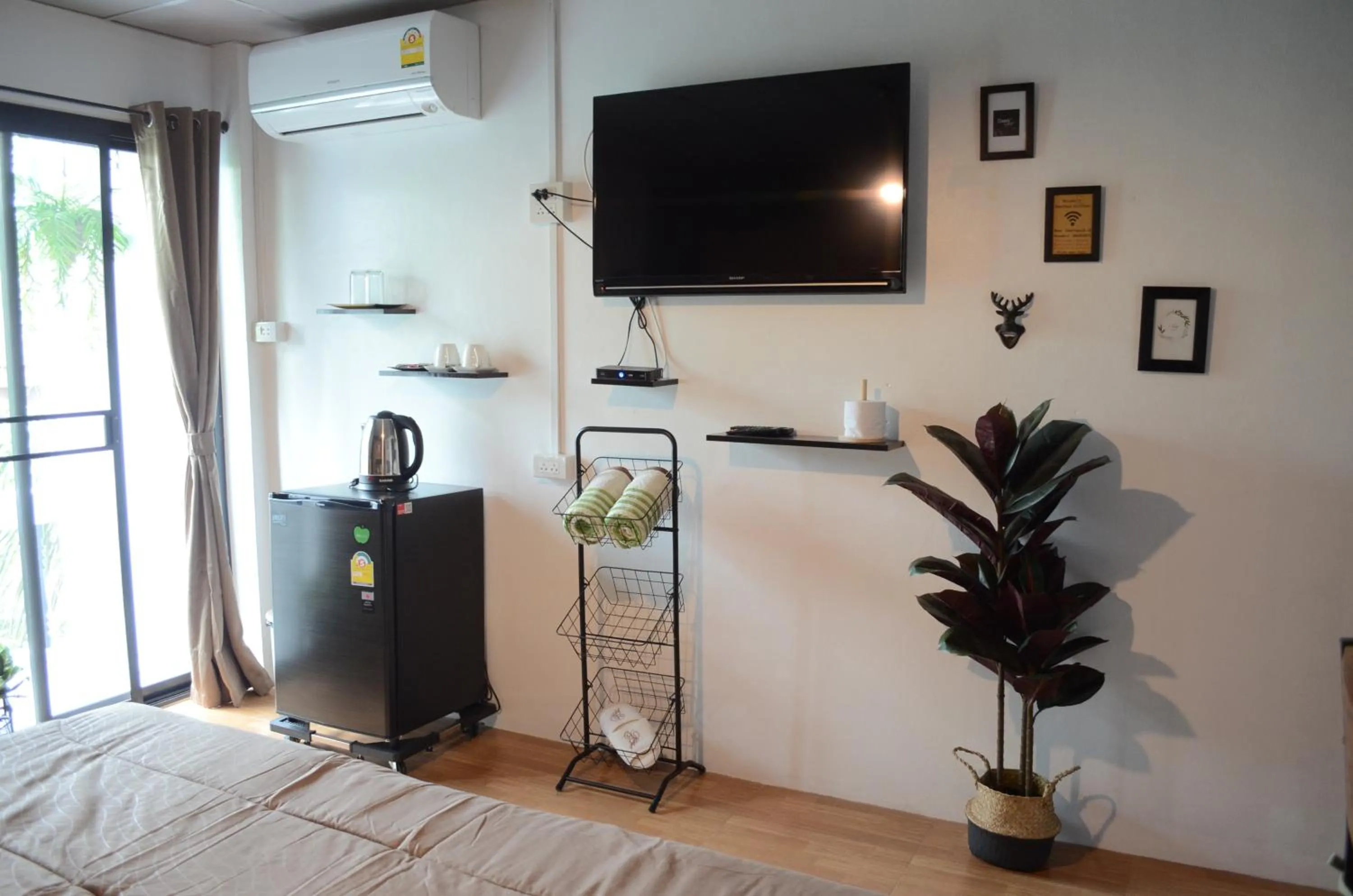 Bed in Dawnthaya Ayutthaya Art House บ้านดอนธยๅ อยุธยา