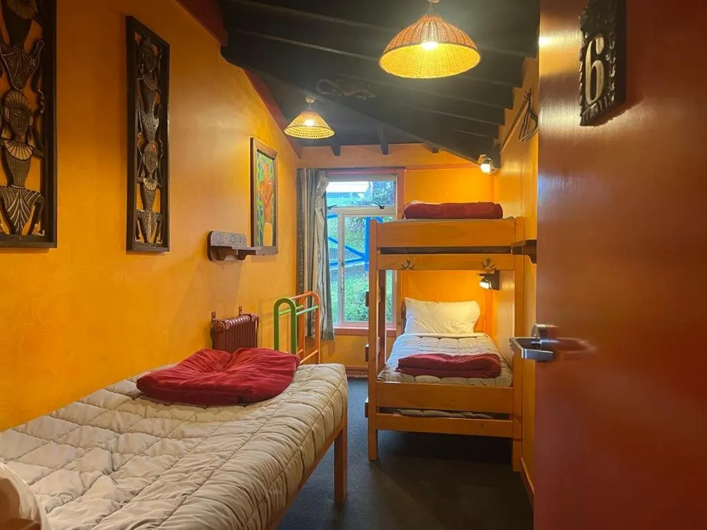 Bed in Global Village Travellers Lodge