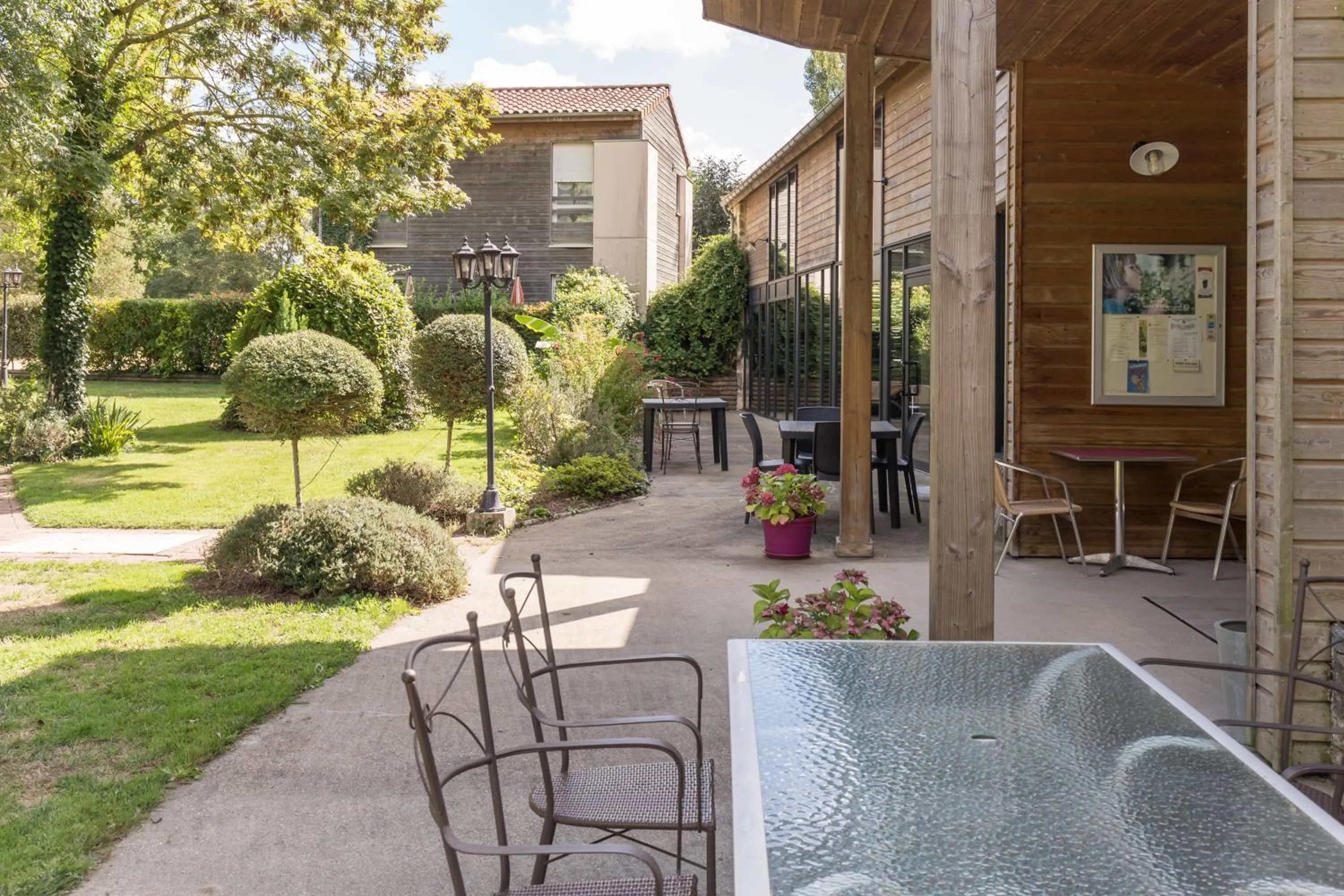 Patio, Swimming Pool in Logis Le Moulin De la Soriniere
