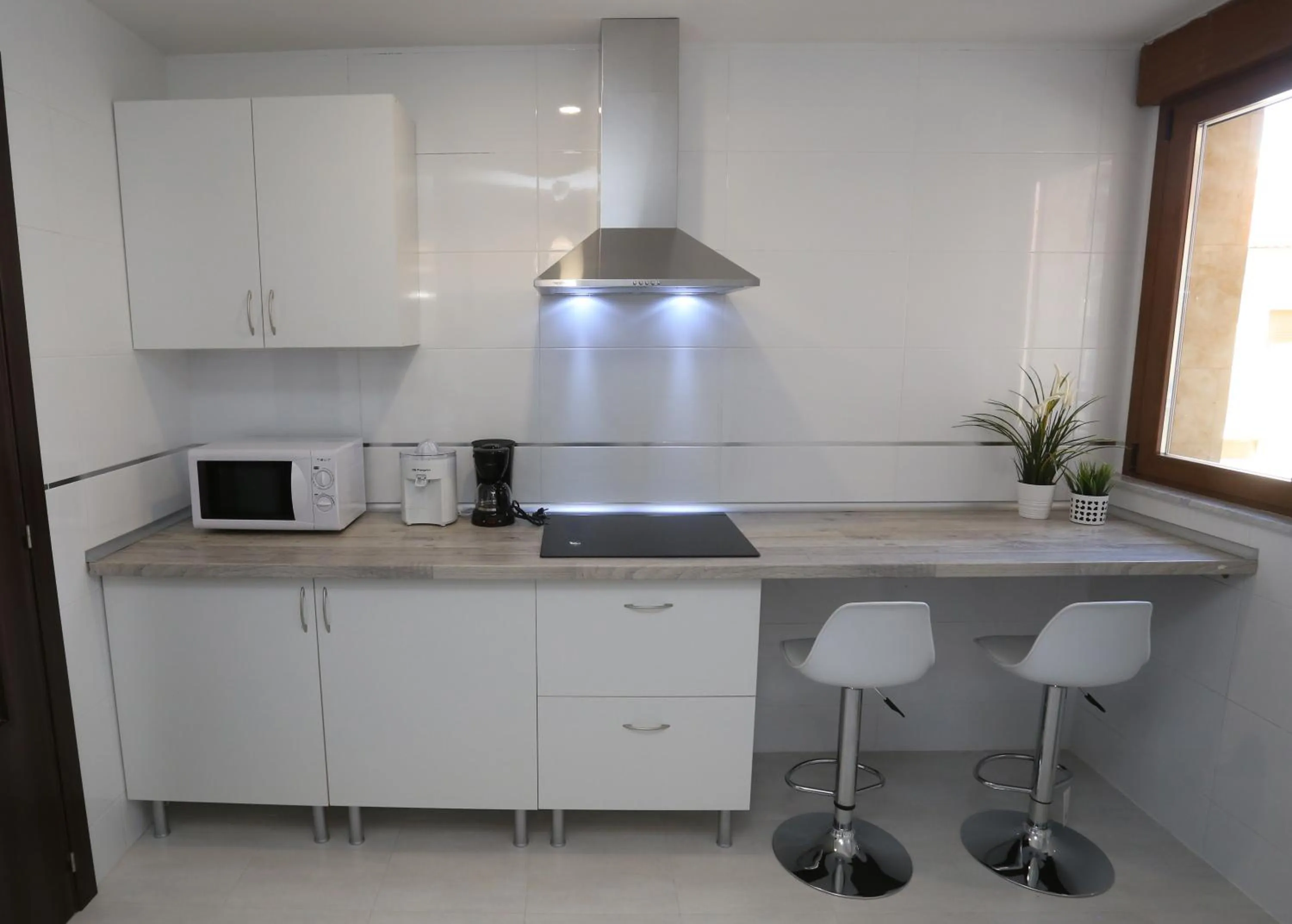 Kitchen or kitchenette in Apartamento turisticos Puente Romano P3 2-A