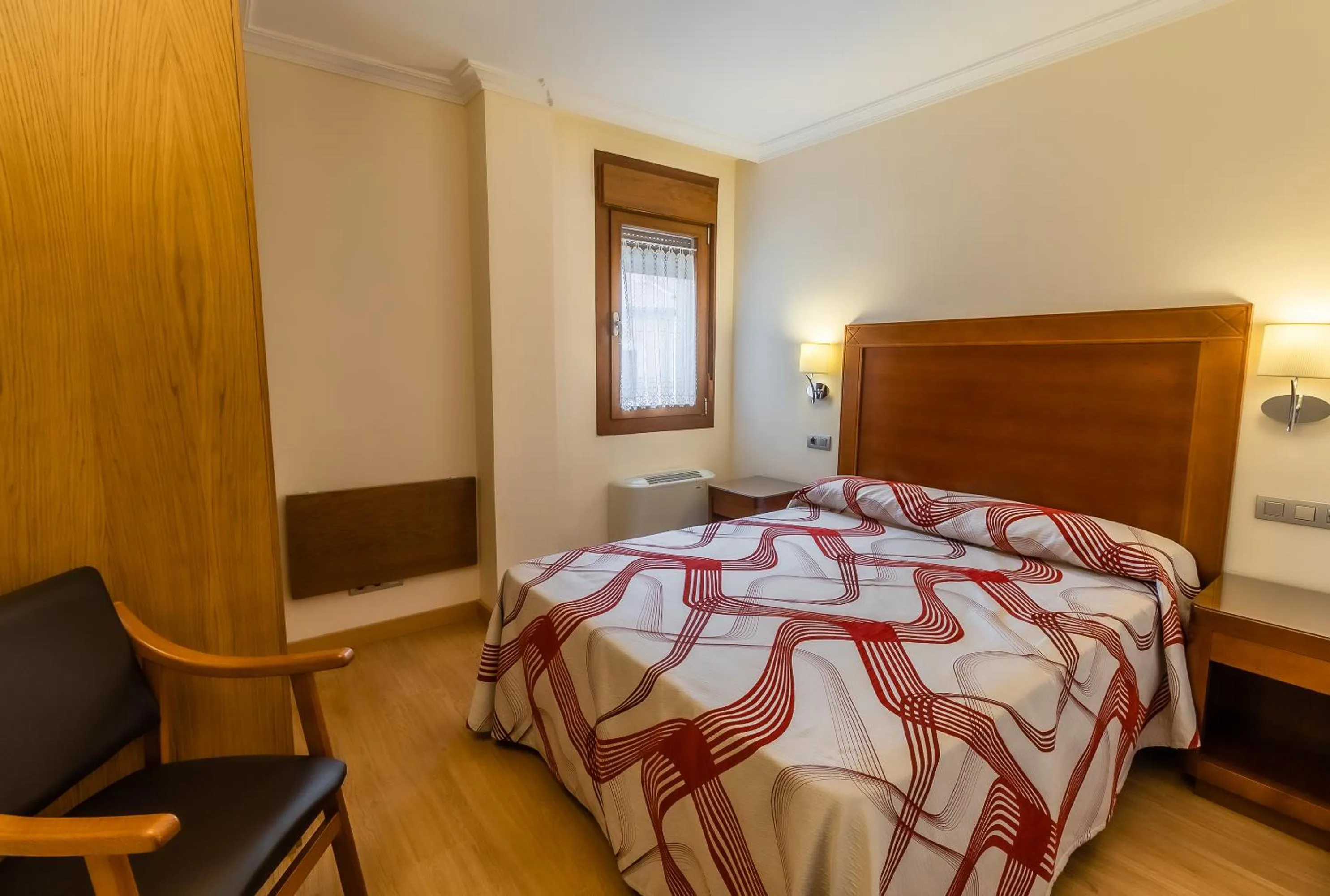 Bedroom, Bed in Apartamentos & casas rurales Santo Domingo de Silos