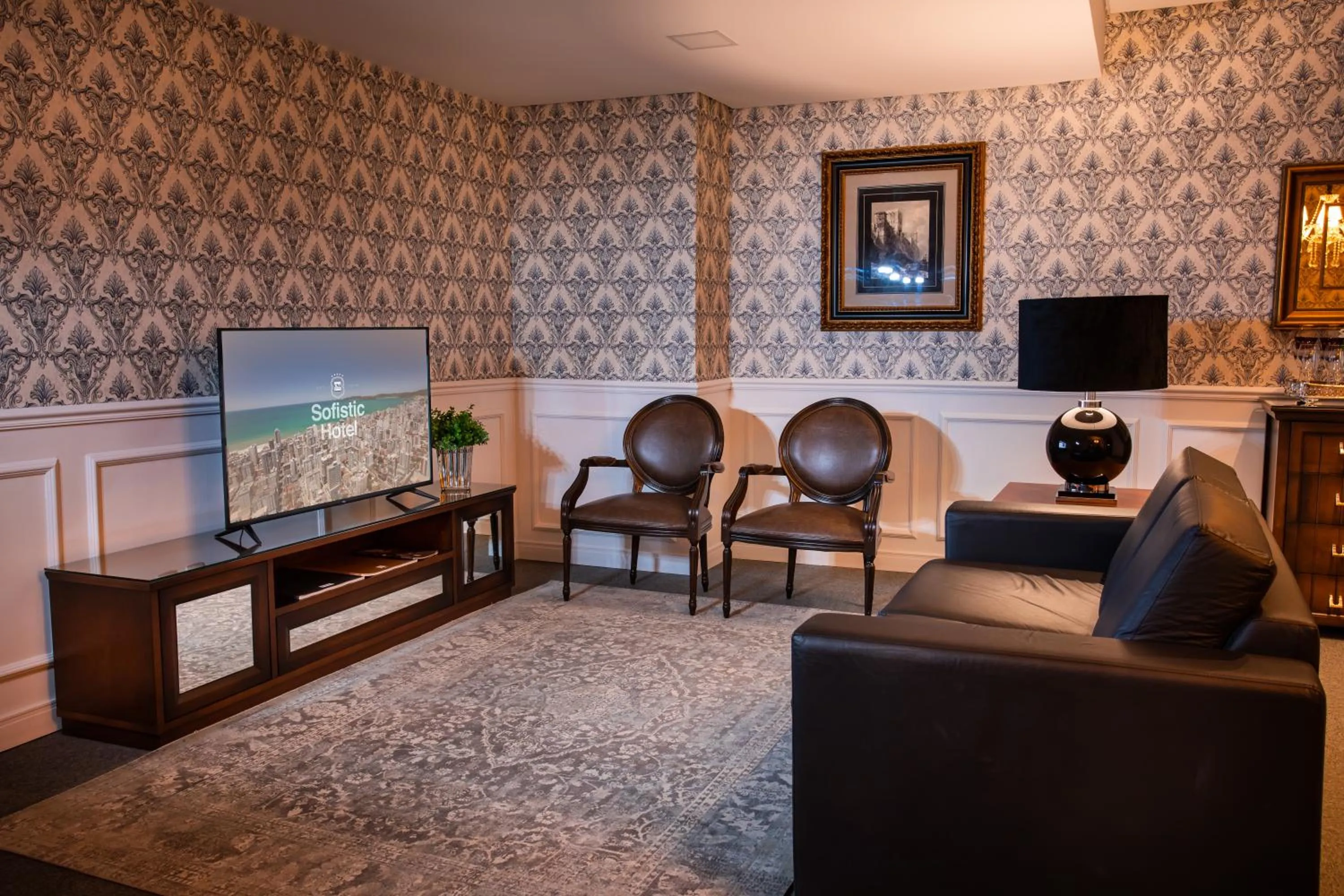 Communal lounge/ TV room in Sofistic Hotel