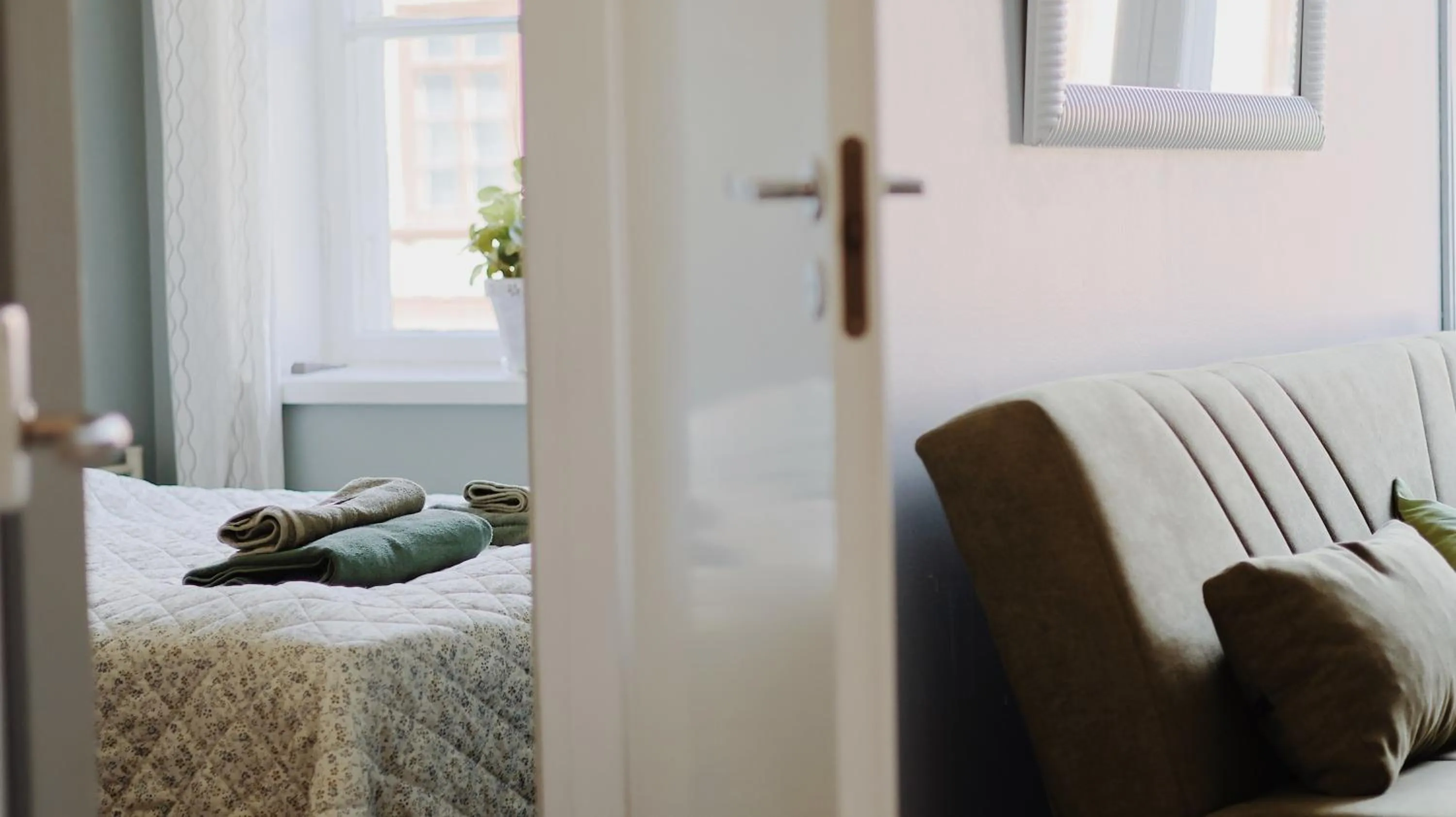 Photo of the whole room, Bed in Huoneistohotelli Marja