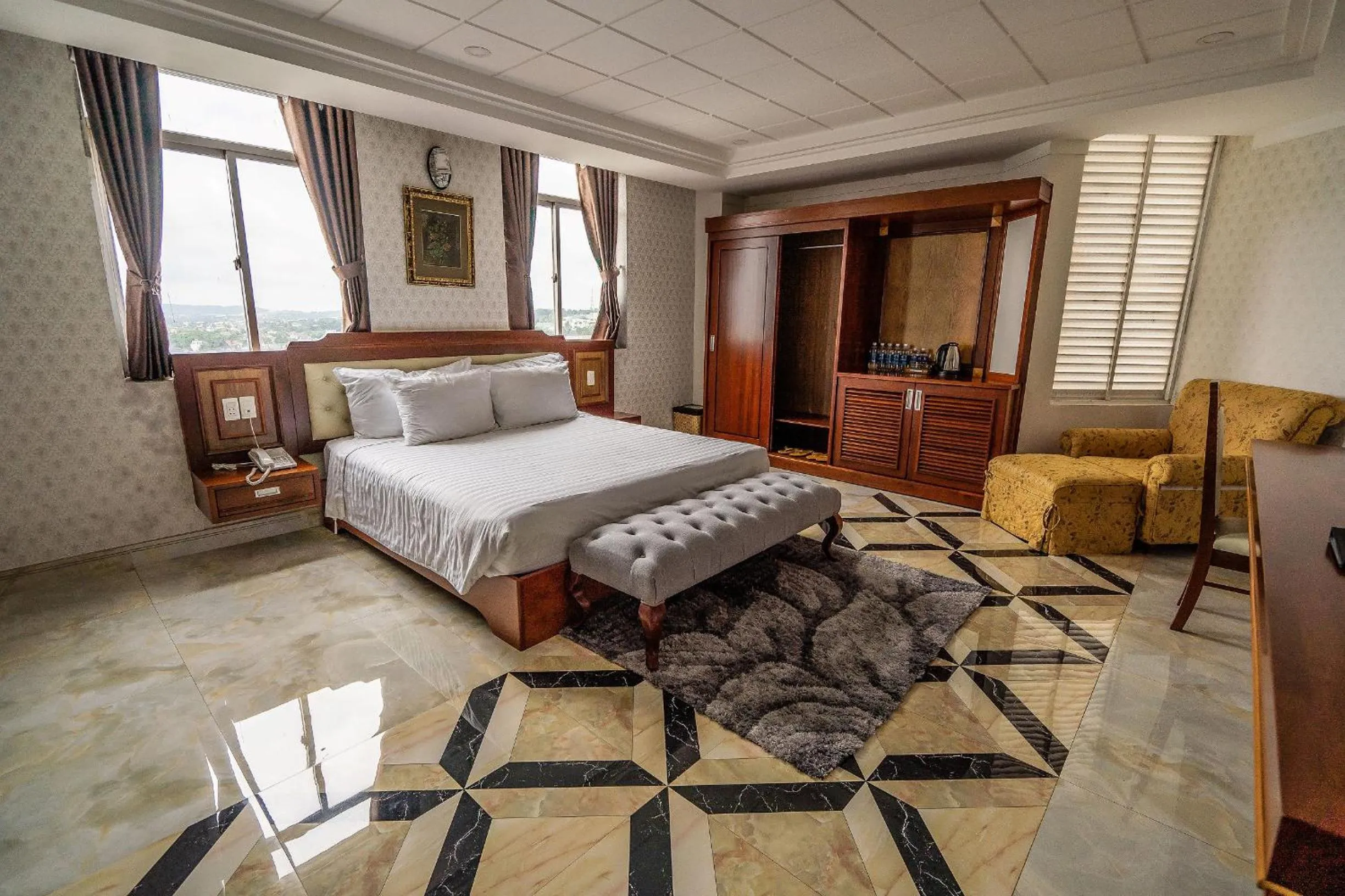 Bed in Duc Long Gia Lai Hotels & Apartment