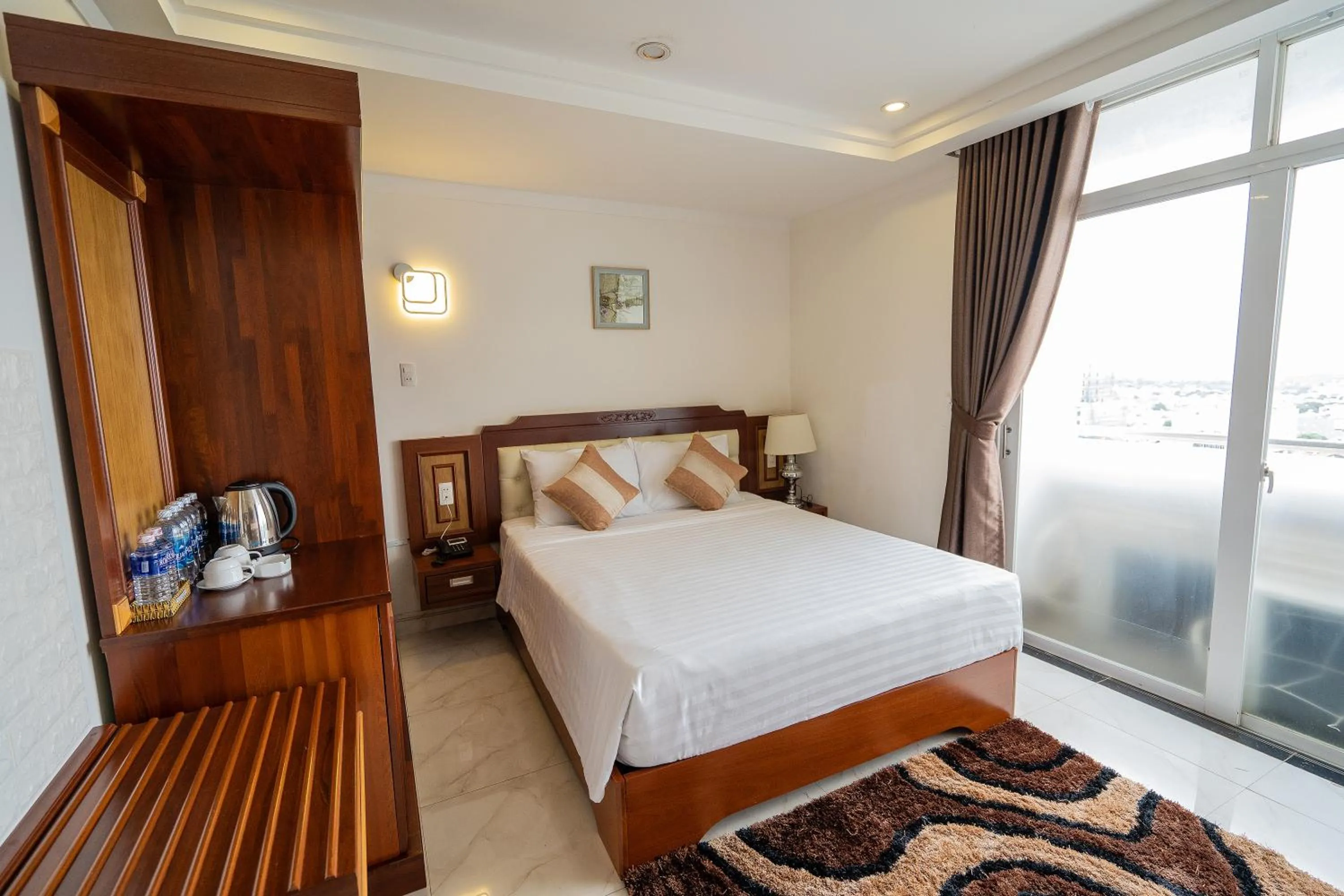 Bed in Duc Long Gia Lai Hotels & Apartment