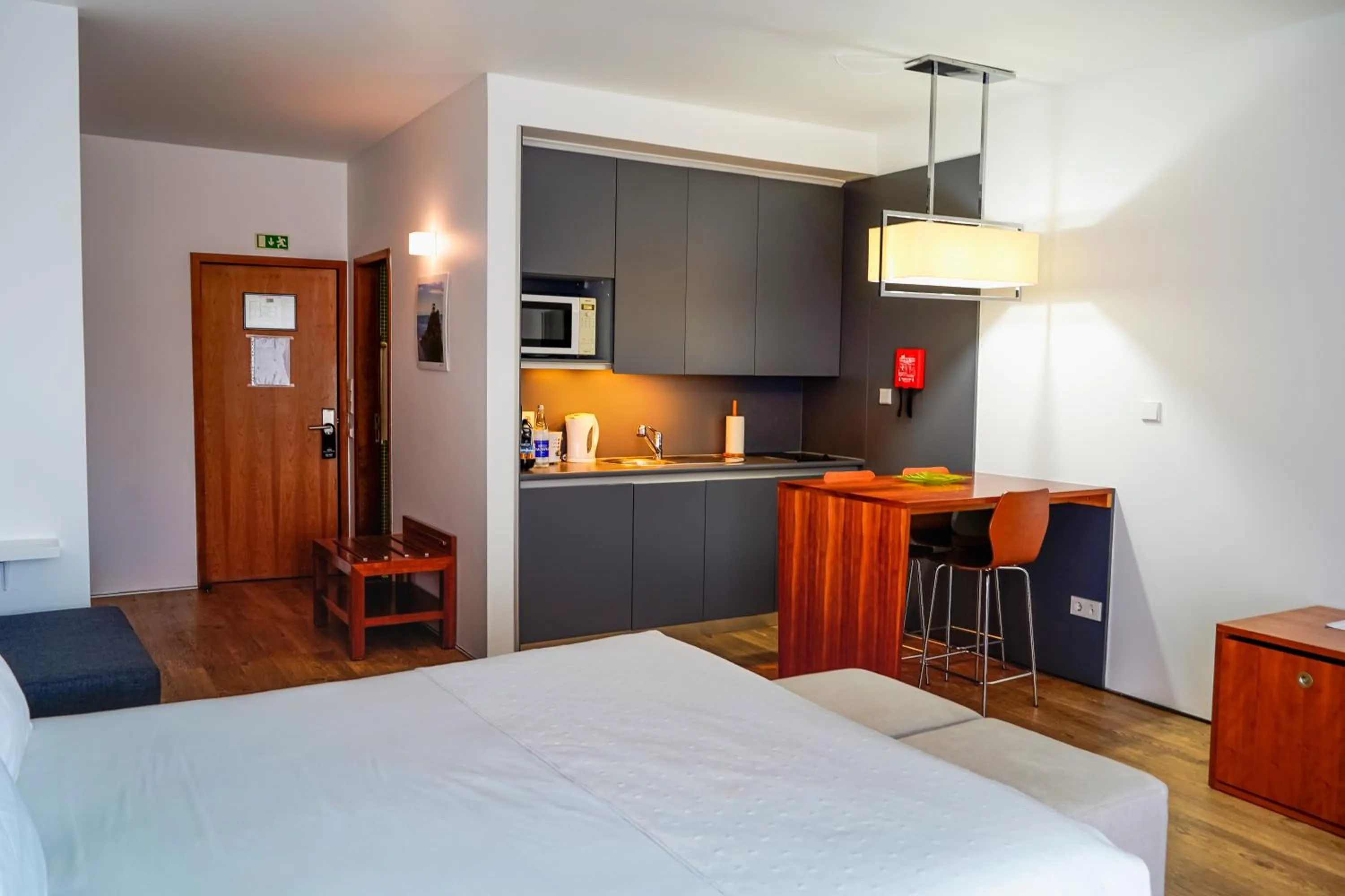 Kitchen or kitchenette, Bed in ANC Resort