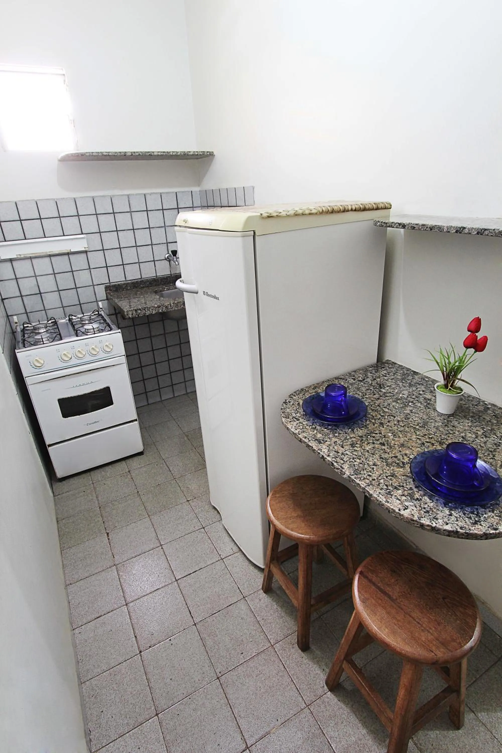 Kitchen or kitchenette in Flat Pousada da Praia