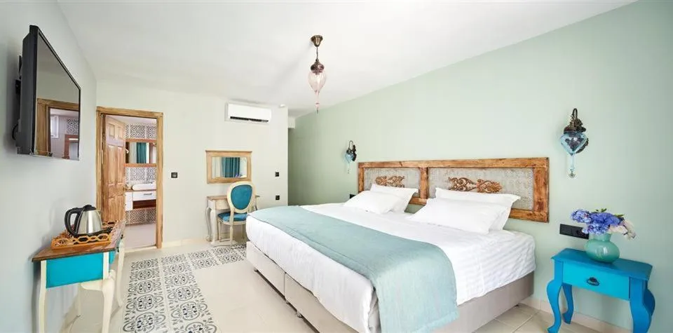 Bed in Fİ Light Solto Boutique Beach Hotel