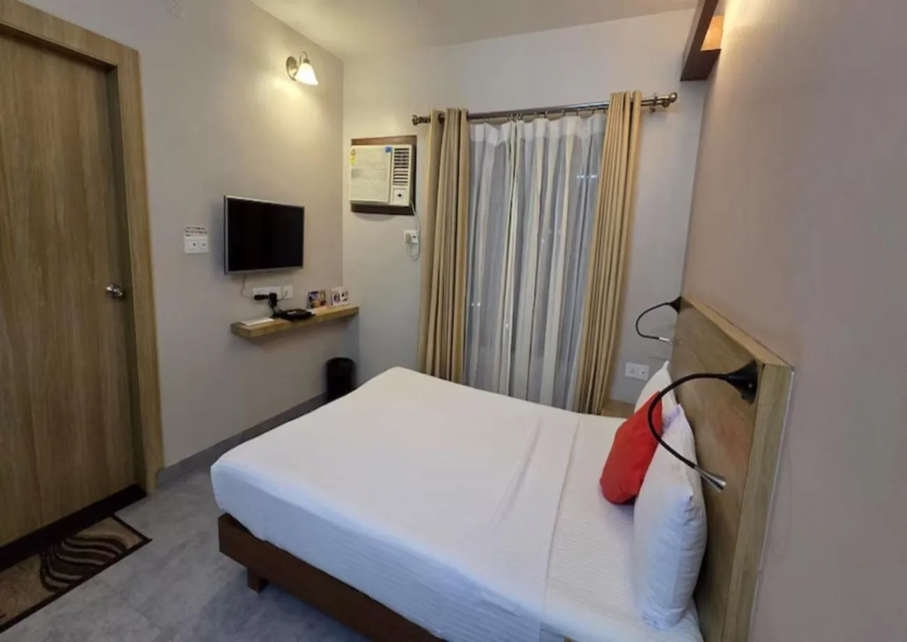 Bed in Hotel Gulmohar Grand