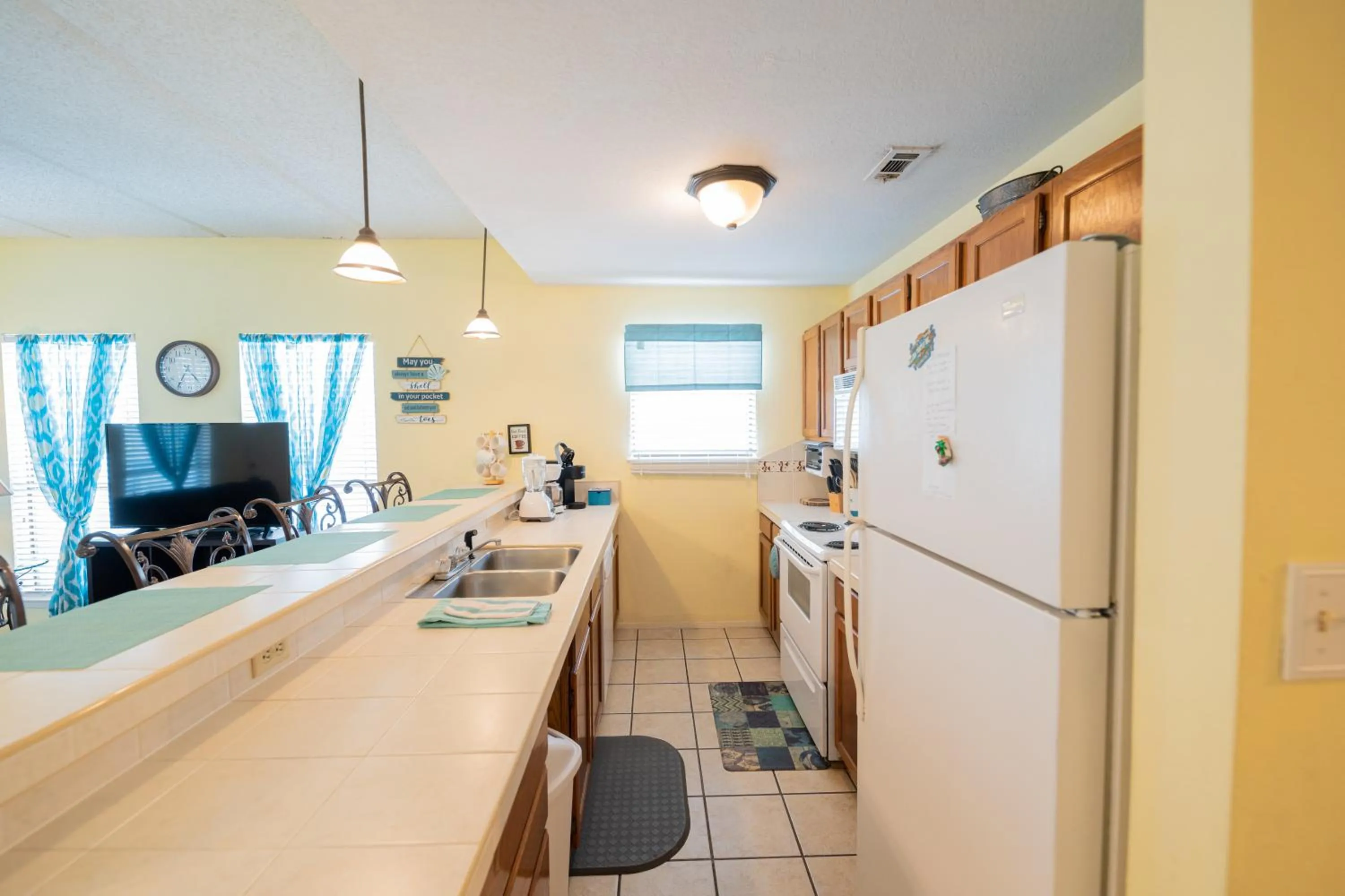 Kitchen or kitchenette in Charming SPI family condo - walking distance to the beach, Sleeps 6, Third Floor, 2025 Traveler Award