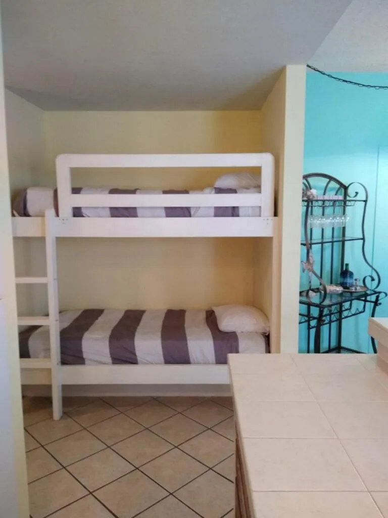 bunk bed, Bed in Charming SPI family condo - walking distance to the beach, Sleeps 6, Third Floor, 2025 Traveler Award