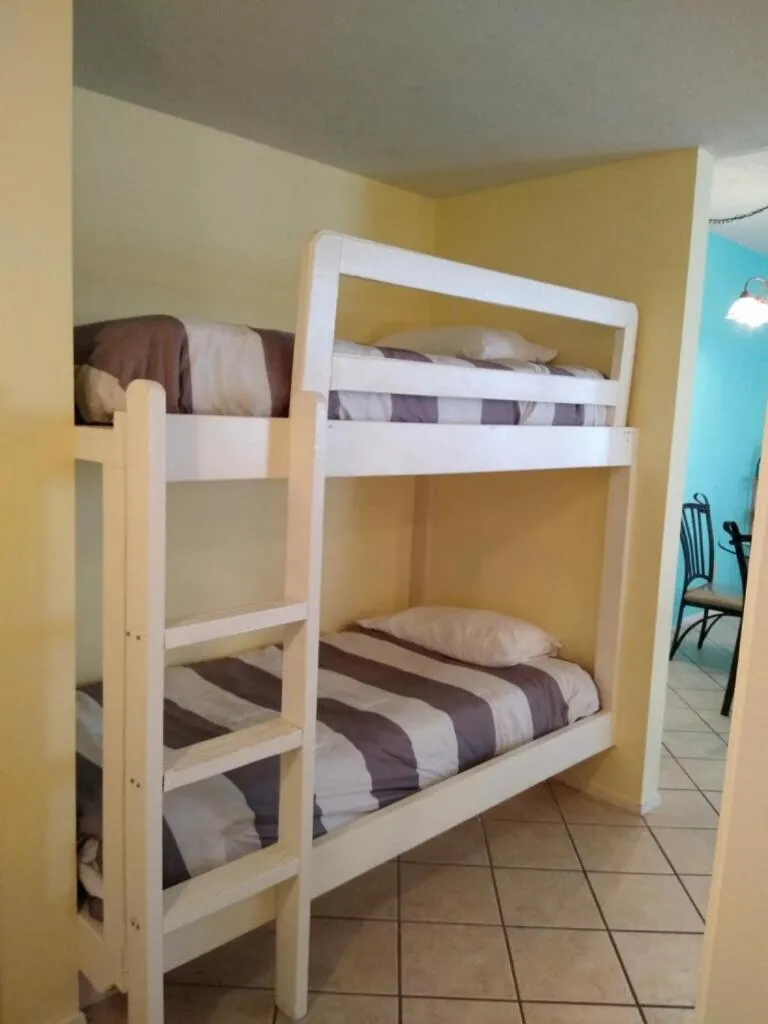 bunk bed, Bed in Charming SPI family condo - walking distance to the beach, Sleeps 6, Third Floor, 2025 Traveler Award