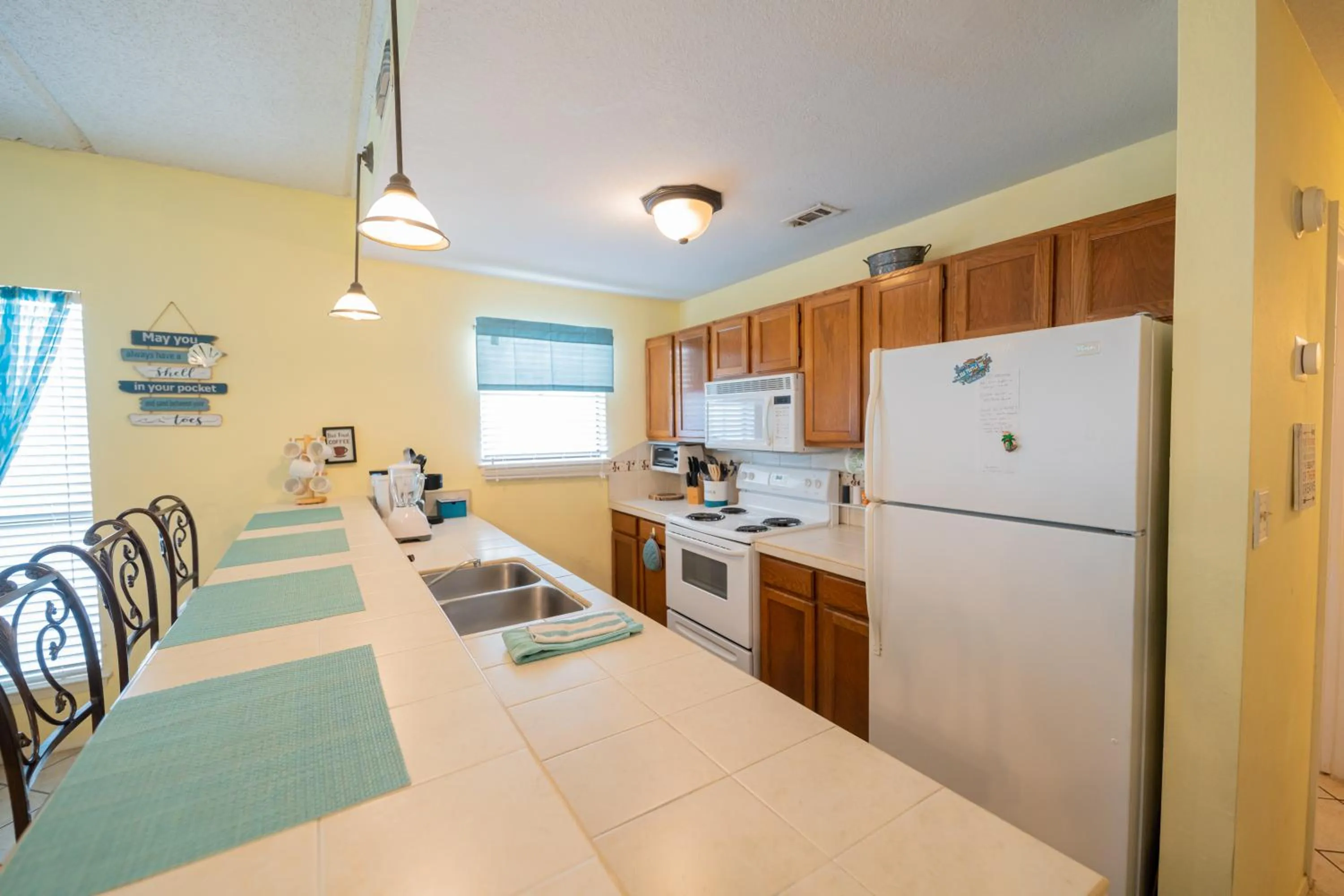 Charming SPI family condo - walking distance to the beach, Sleeps 6, Third Floor, 2025 Traveler Award