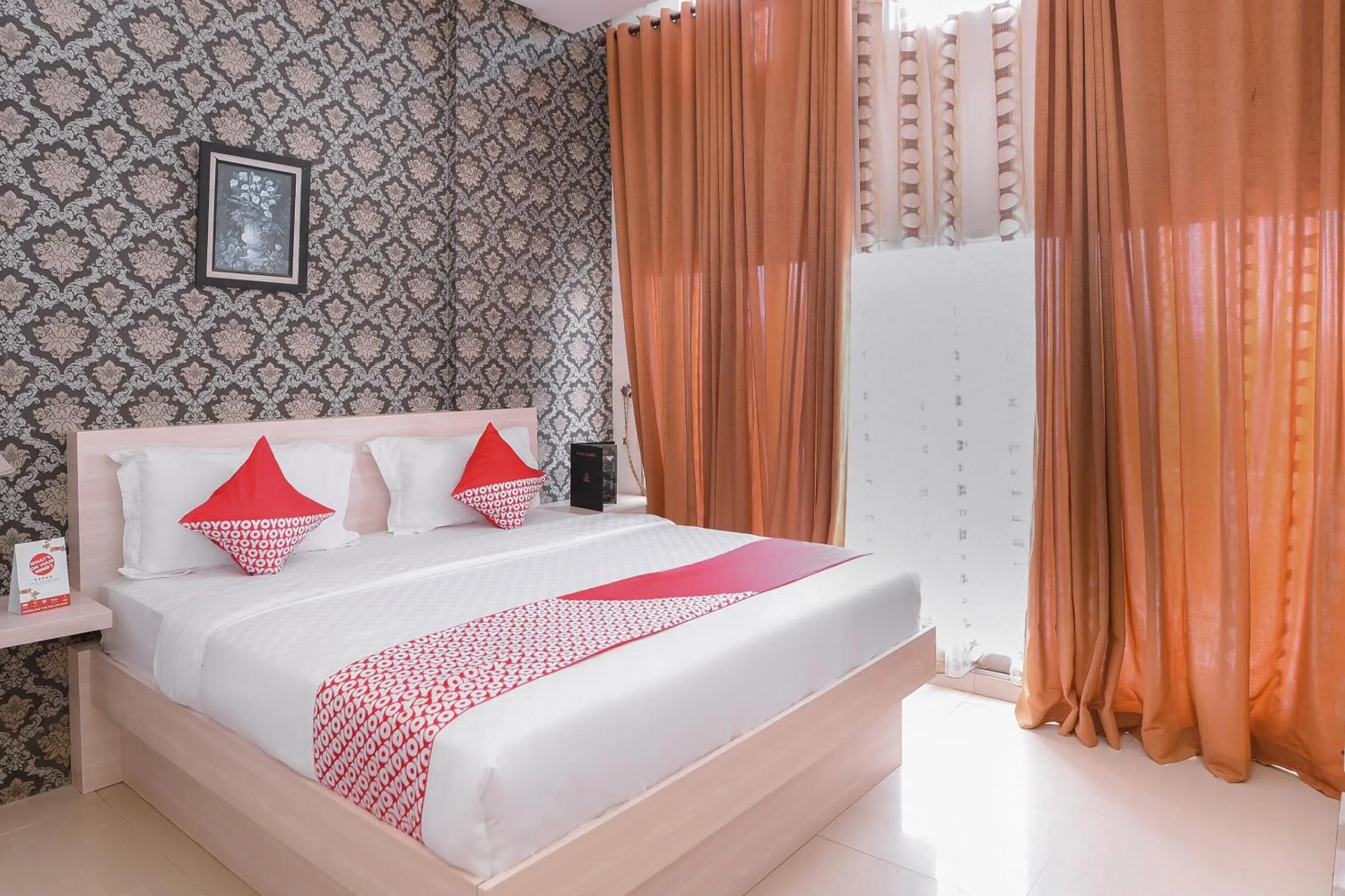 Bedroom in Capital O 854 Ub Caisar Hotel