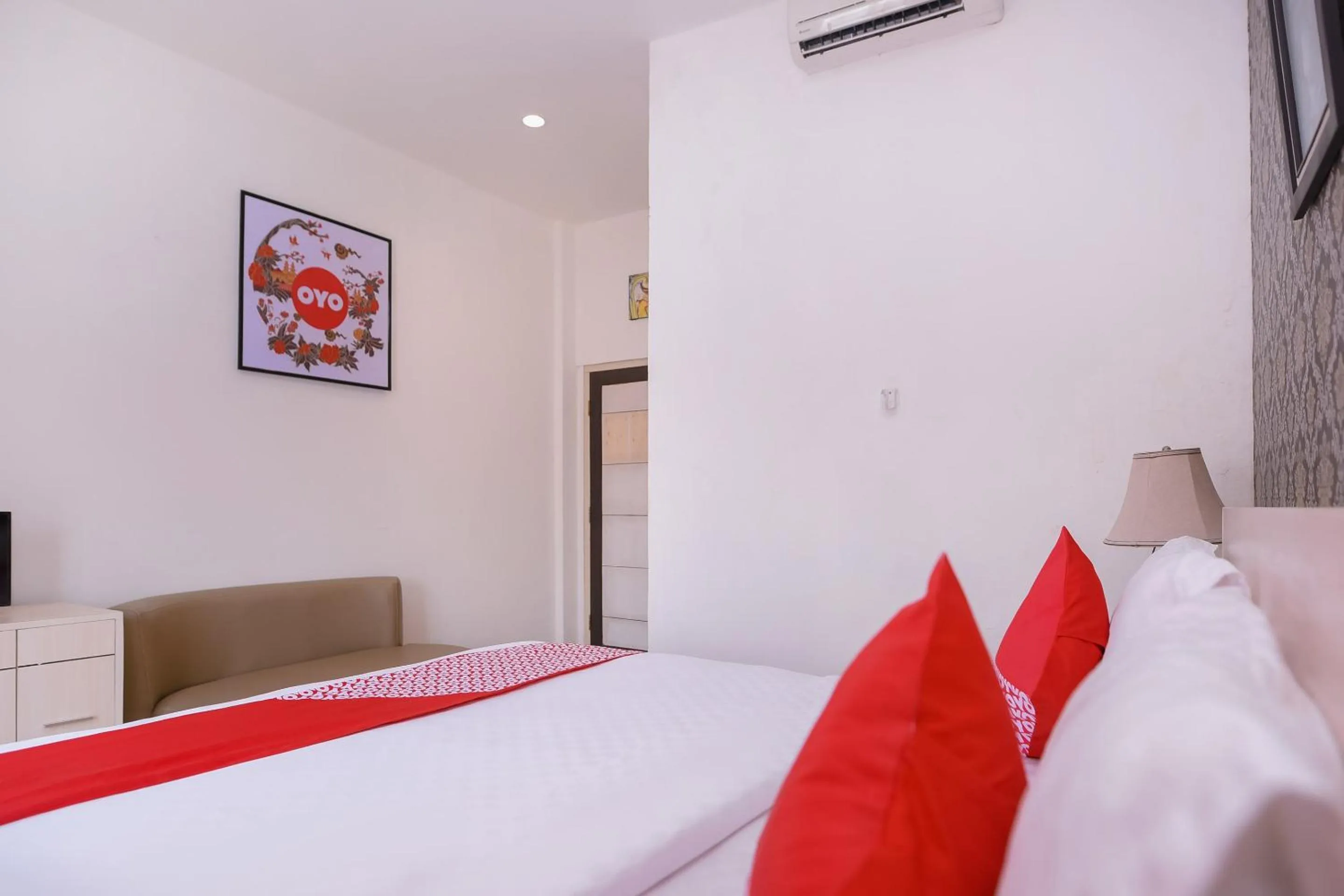 Bedroom in Capital O 854 Ub Caisar Hotel