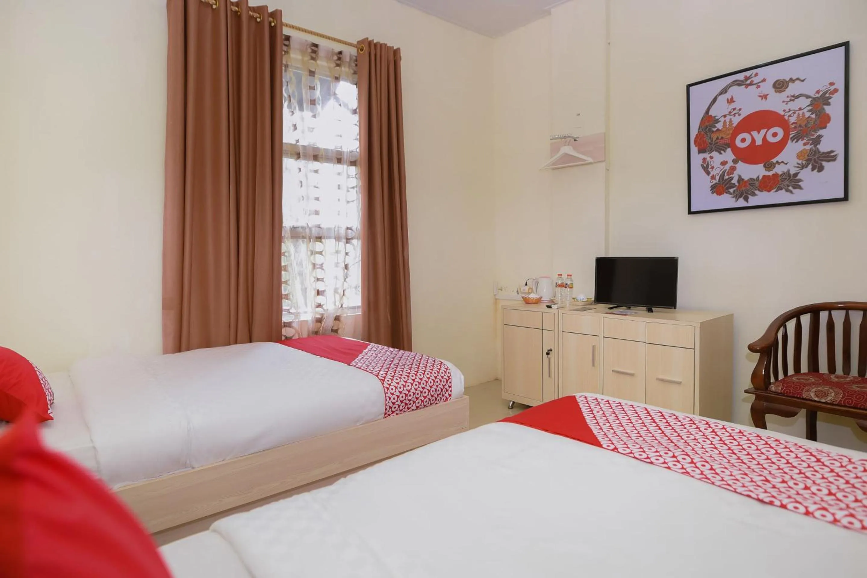 Bedroom in Capital O 854 Ub Caisar Hotel