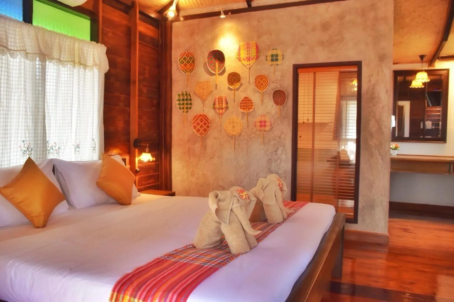 Bed in Mango House Sukhothai