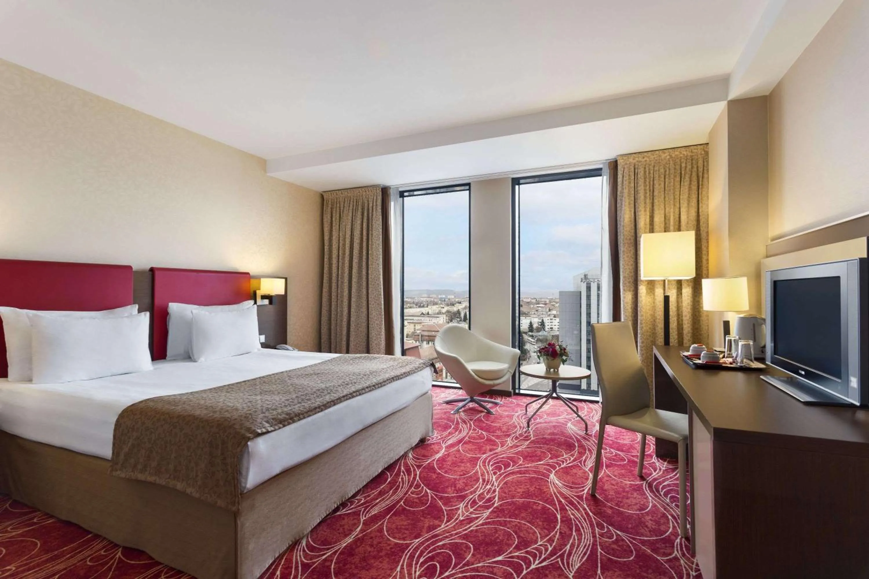 Photo of the whole room, Bed in Ramada Sibiu Hotel