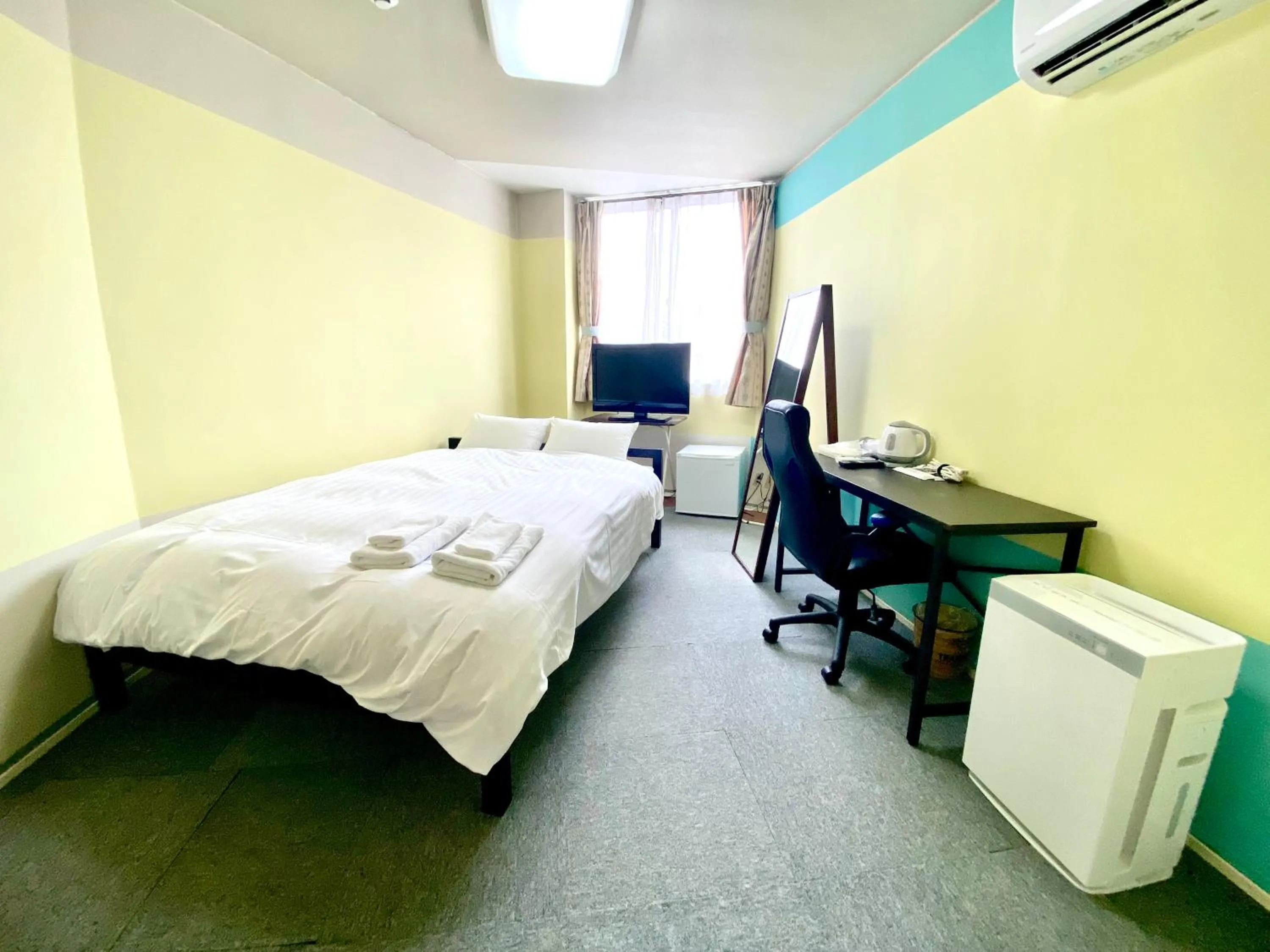 Bed in HendaKara Hotel