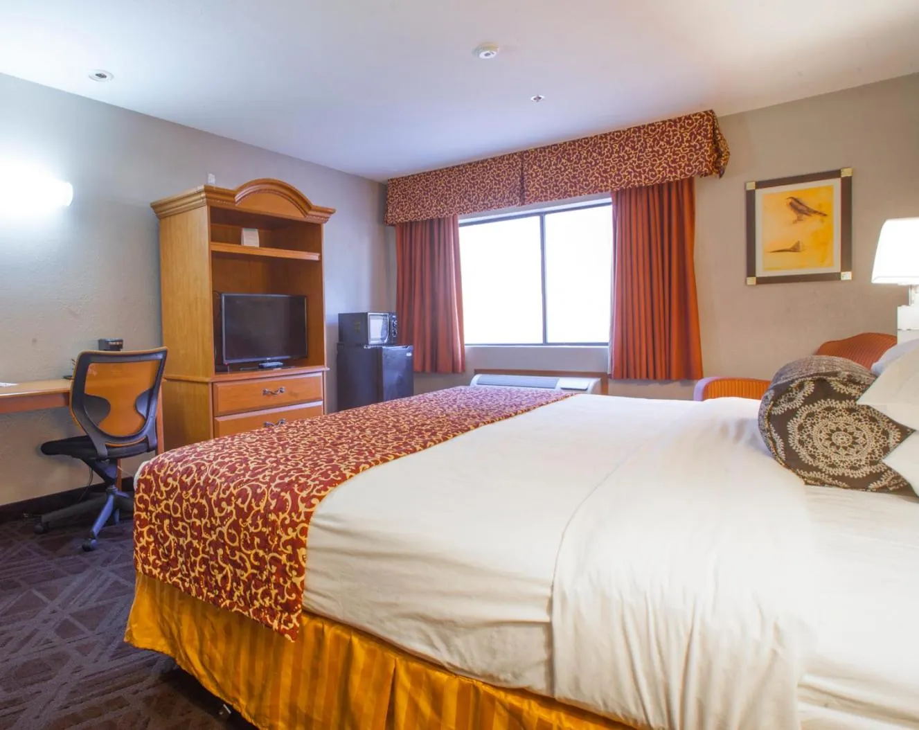 Bedroom, Bed in Ramada by Wyndham Barstow