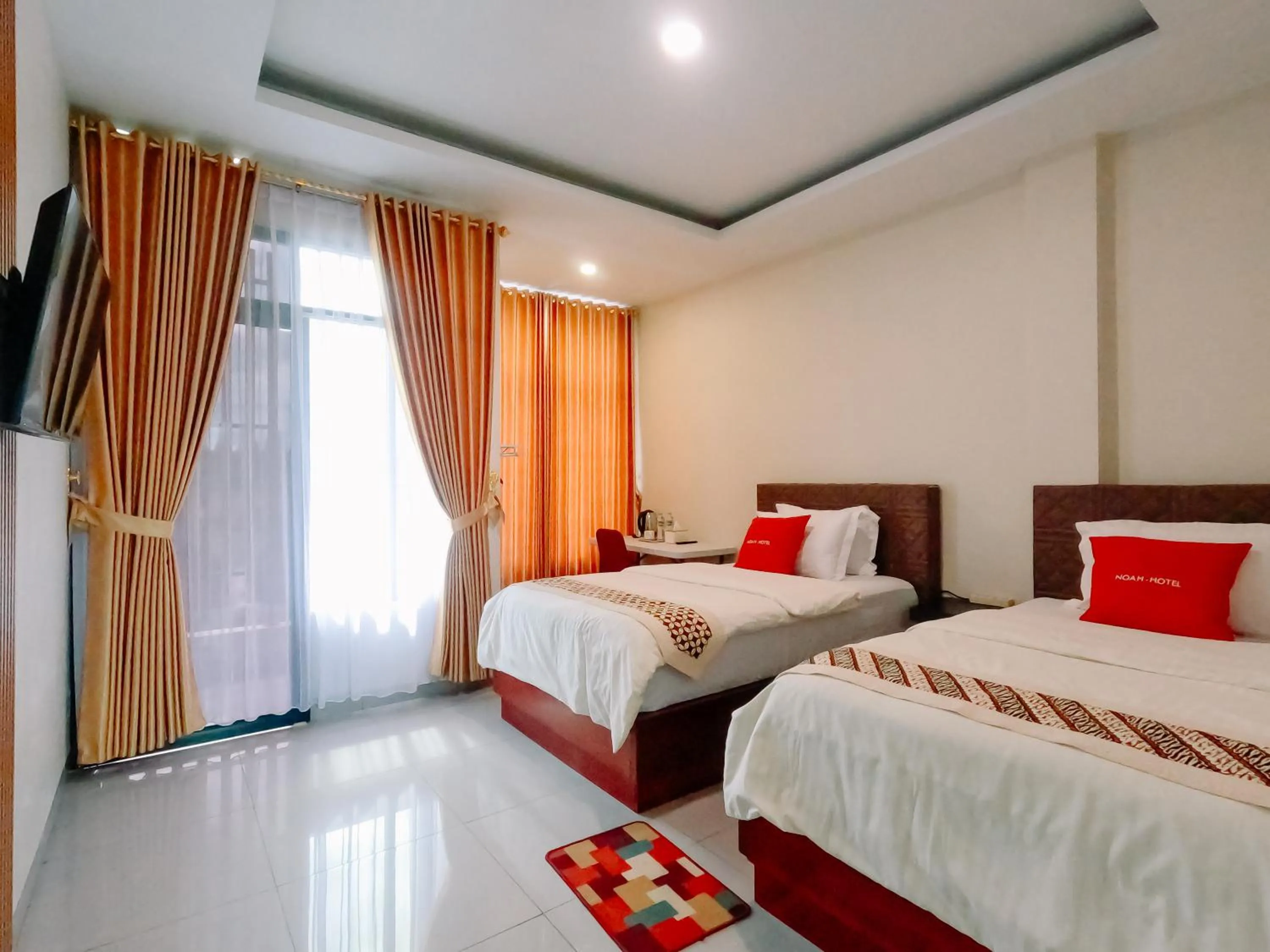 Bed in Noah Hotel Silangit