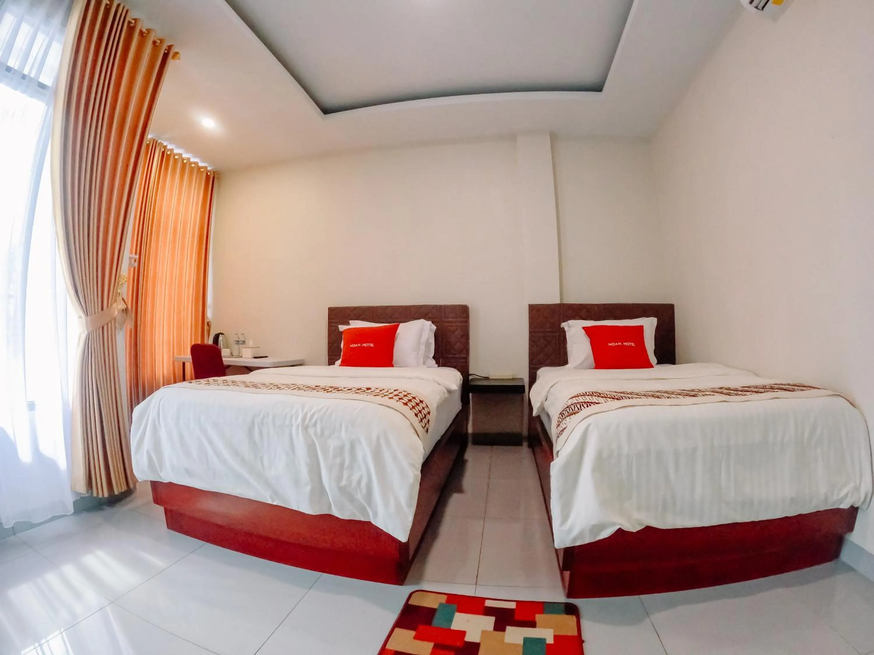 Bed in Noah Hotel Silangit